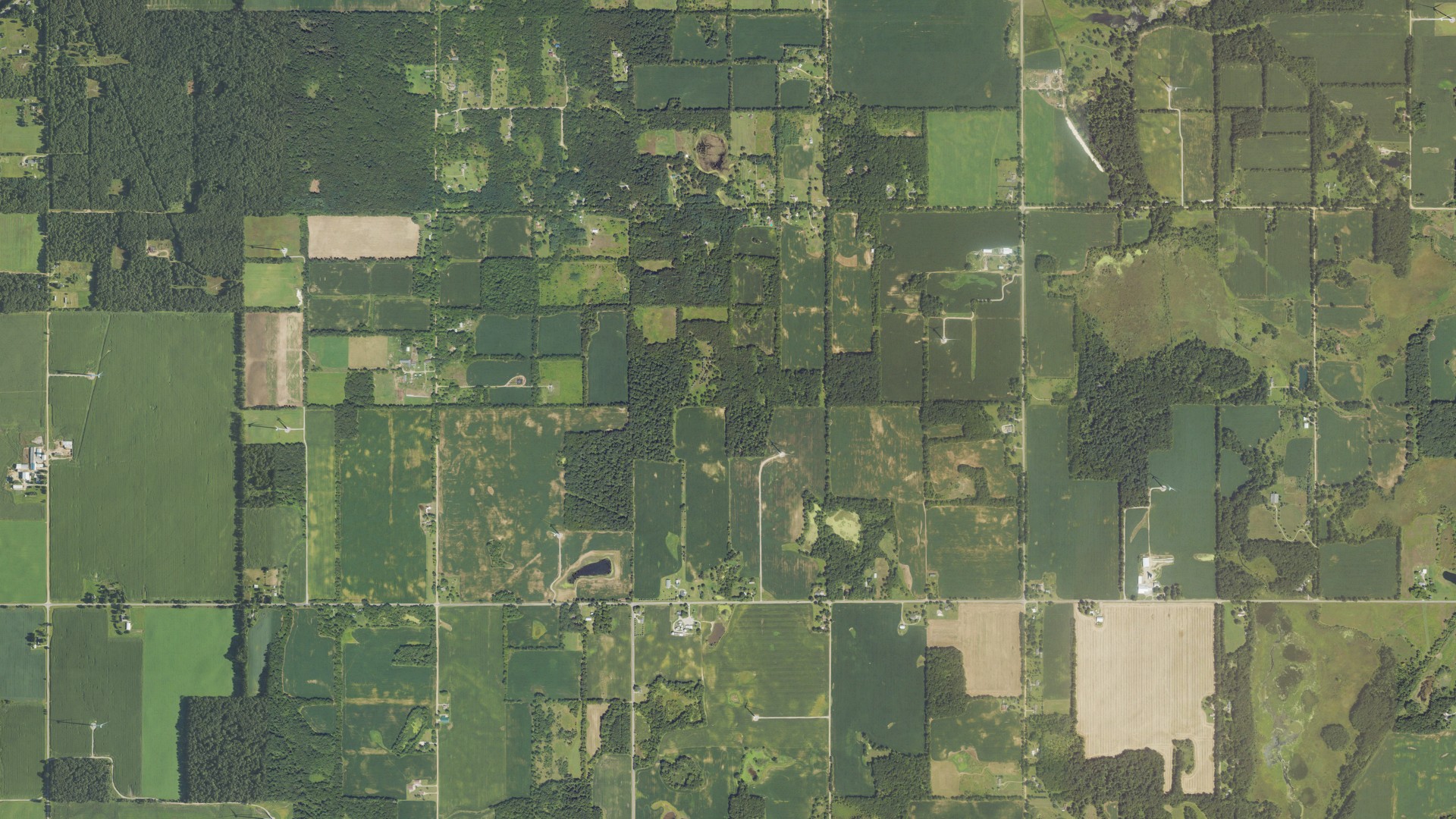 Natural-color aerial photograph of land around Moscow, Michigan
