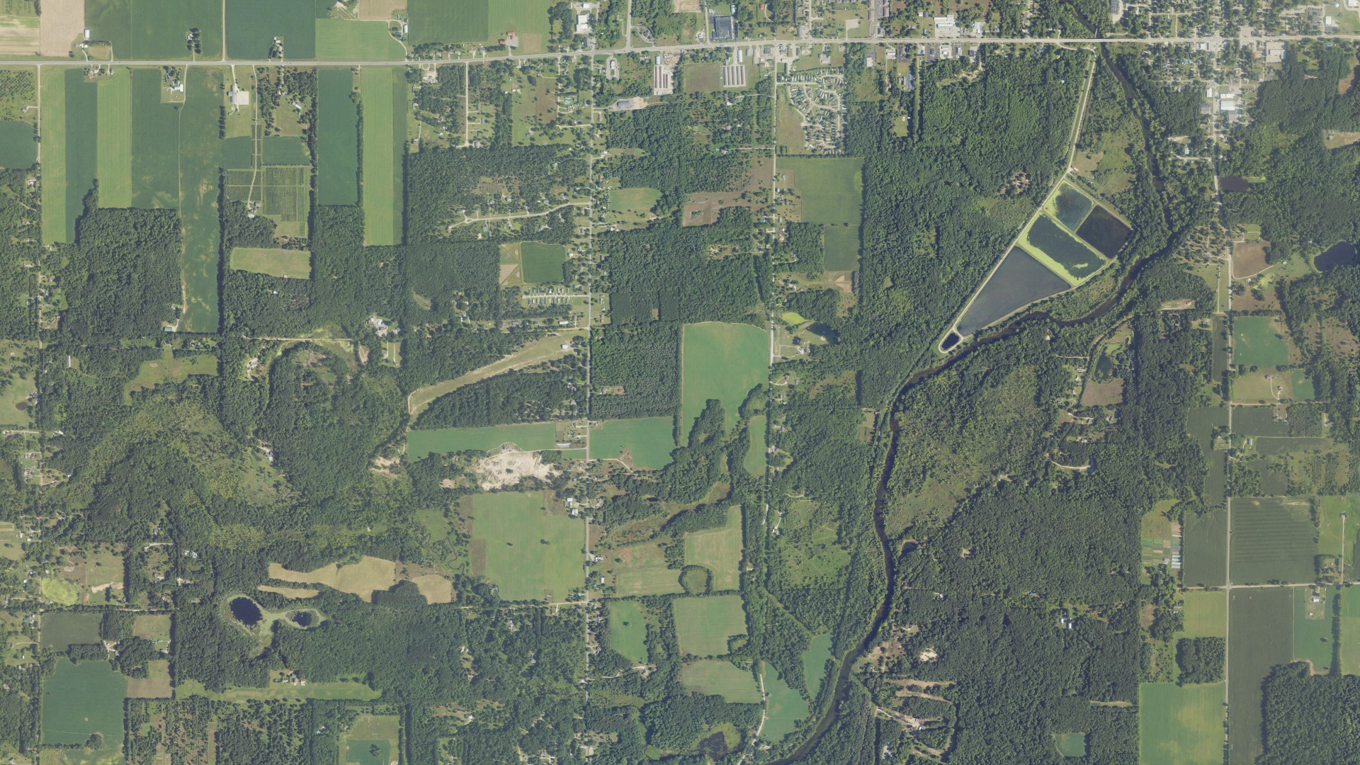 Natural-color aerial photograph of land around Otisco, Michigan