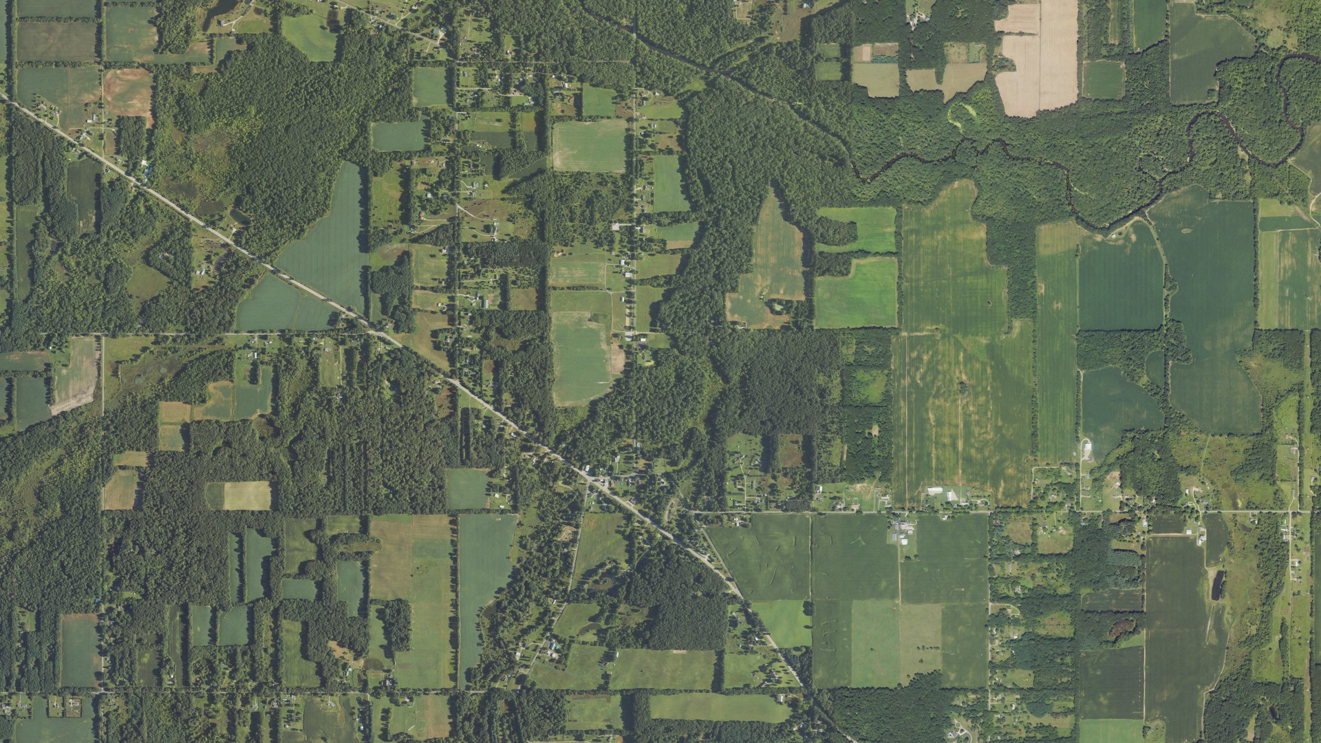Natural-color aerial photograph of land around Tompkins, Michigan