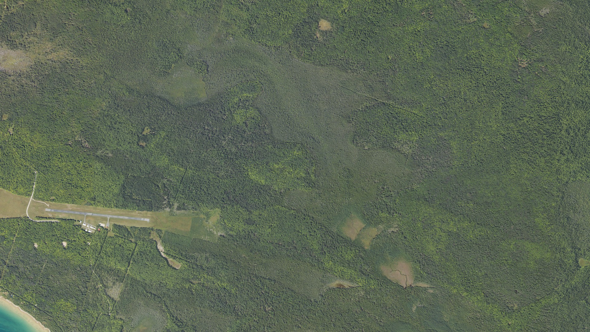 Natural-color aerial photograph of land around Bois Blanc, Michigan