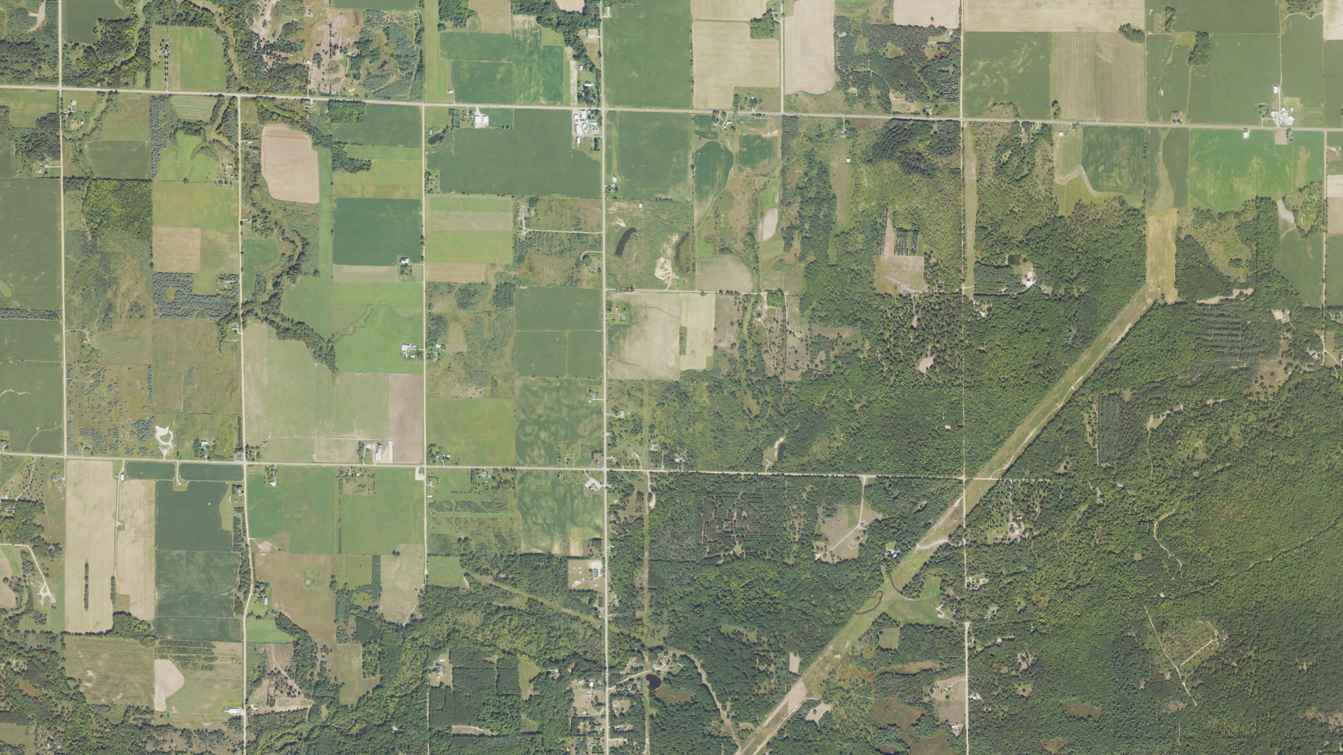 Natural-color aerial photograph of land around Victory, Michigan