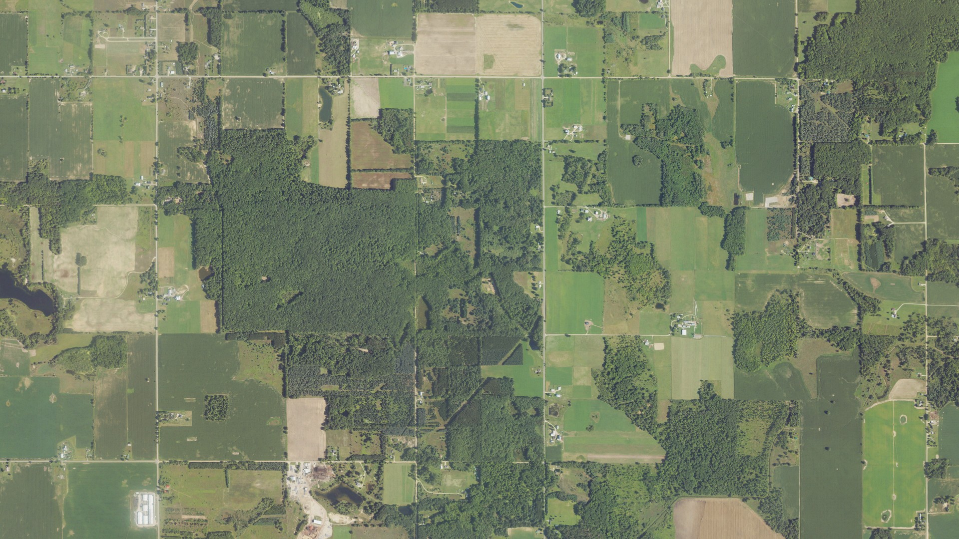 Natural-color aerial photograph of land around Hinton, Michigan