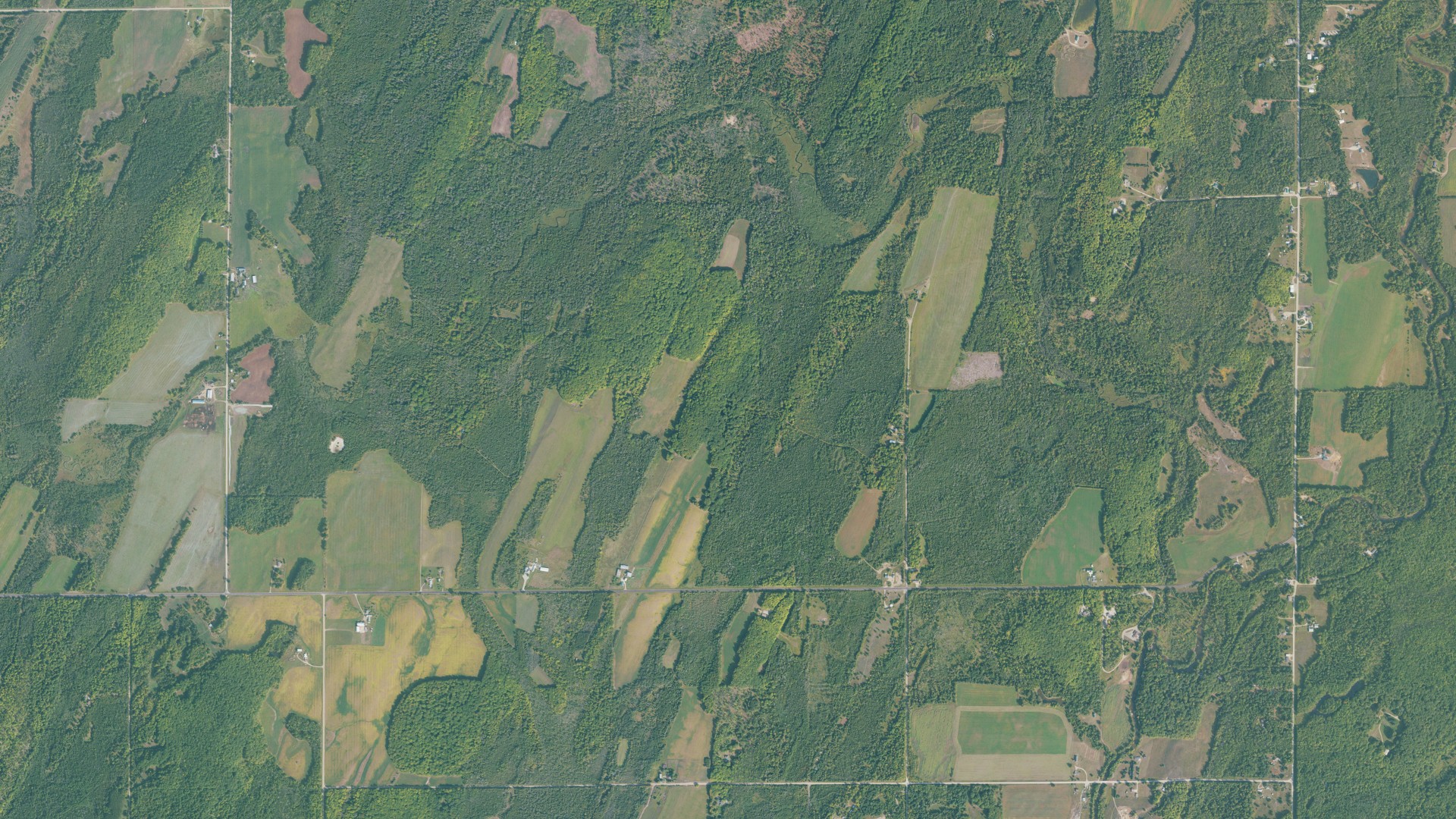 Natural-color aerial photograph of land around Gourley, Michigan