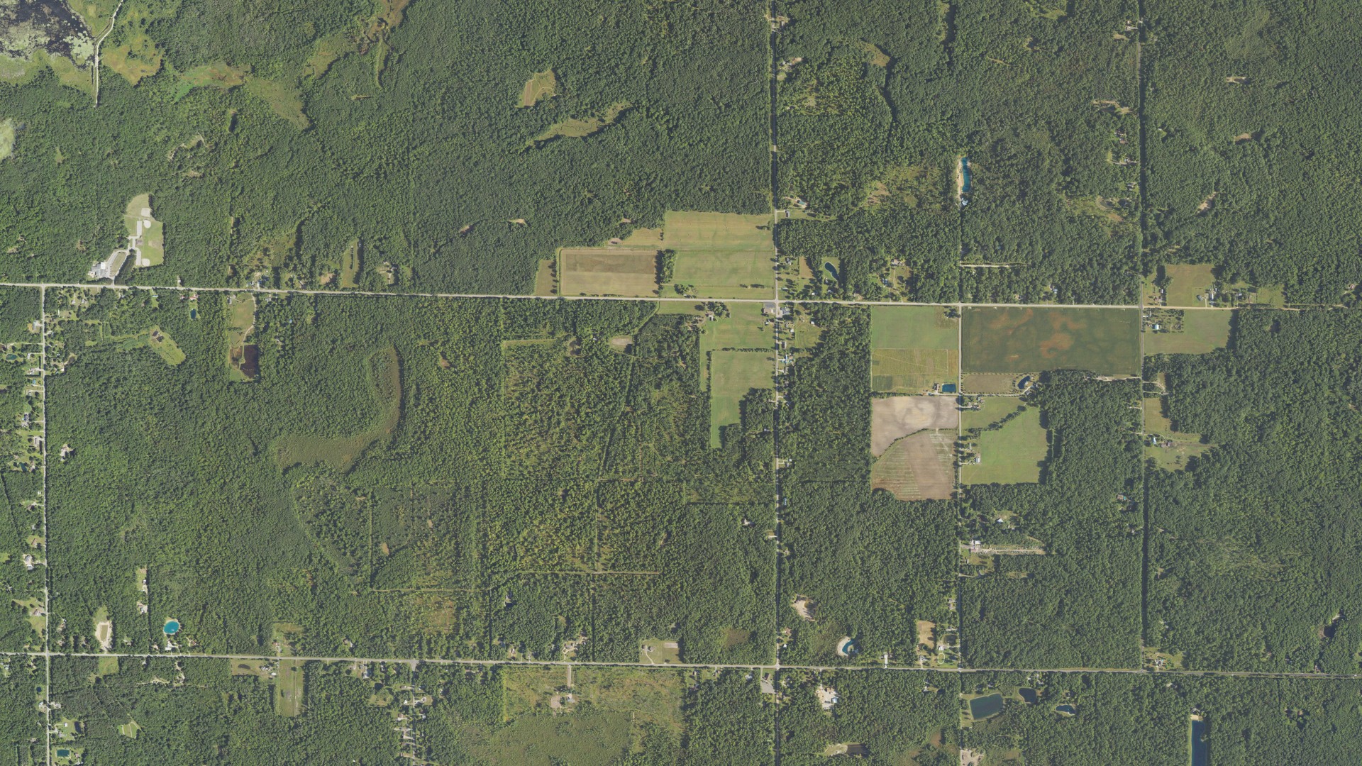 Aerial view of land around Mills, Michigan