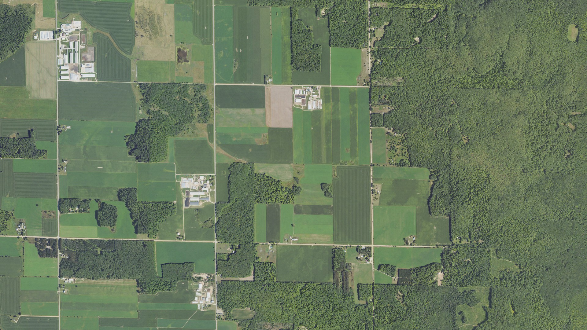 Aerial view of land around Aetna, Michigan