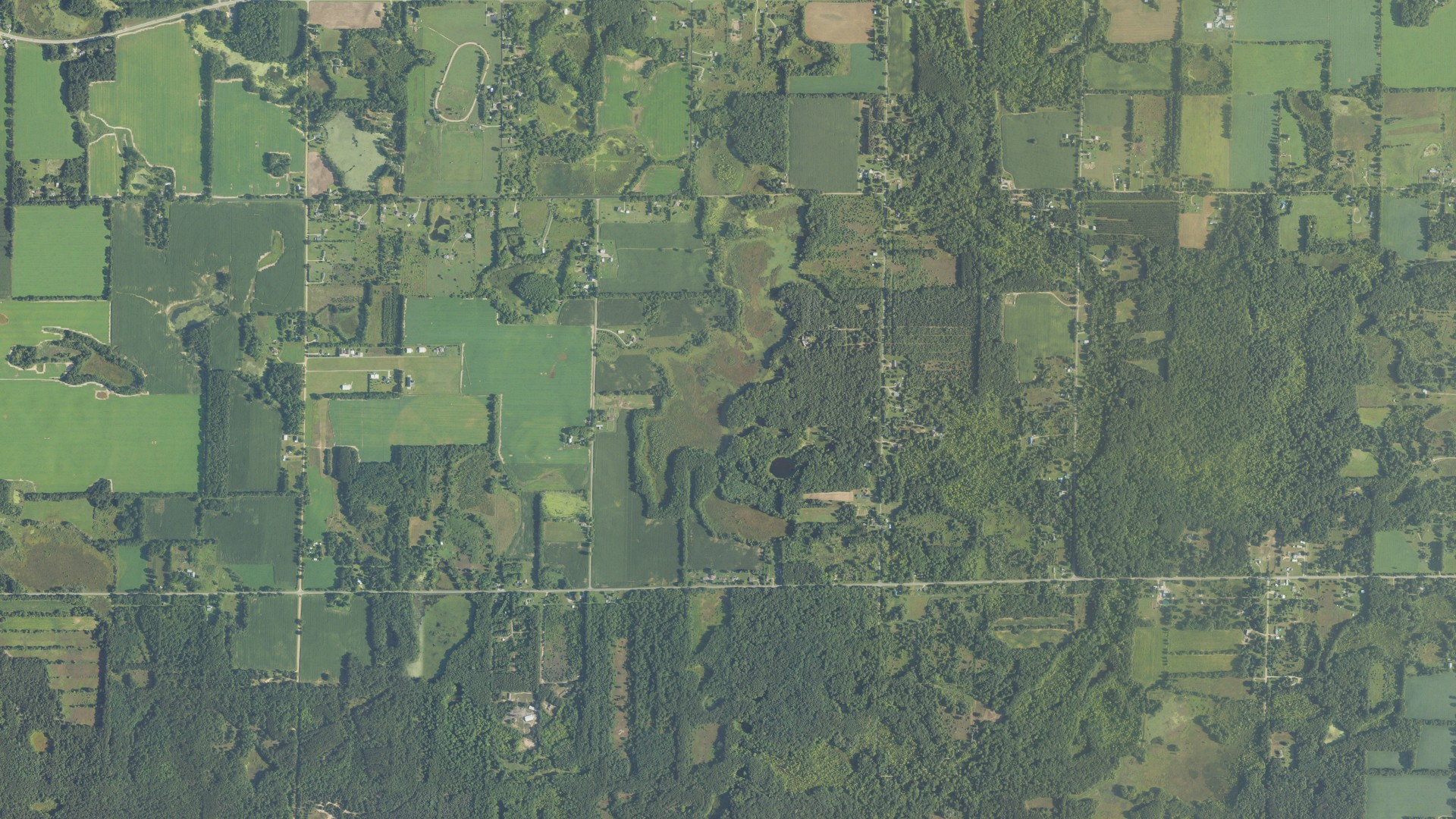 Natural-color aerial photograph of land around Fairplain, Michigan