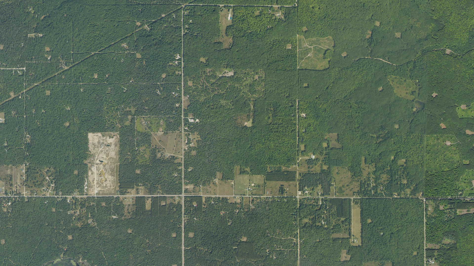 Aerial view of land around Albert, Michigan