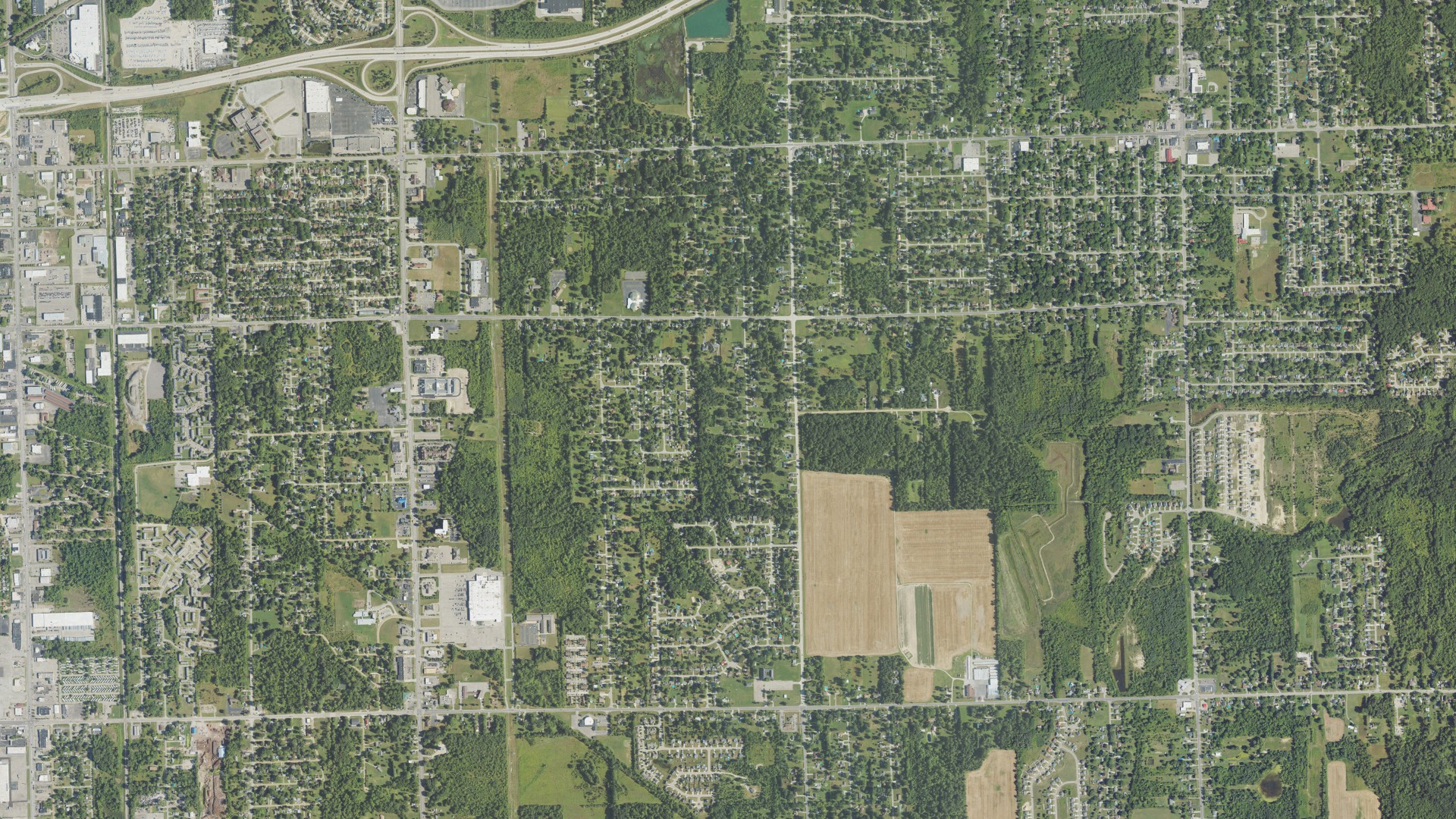 Natural-color aerial photograph of land around Burton, Michigan