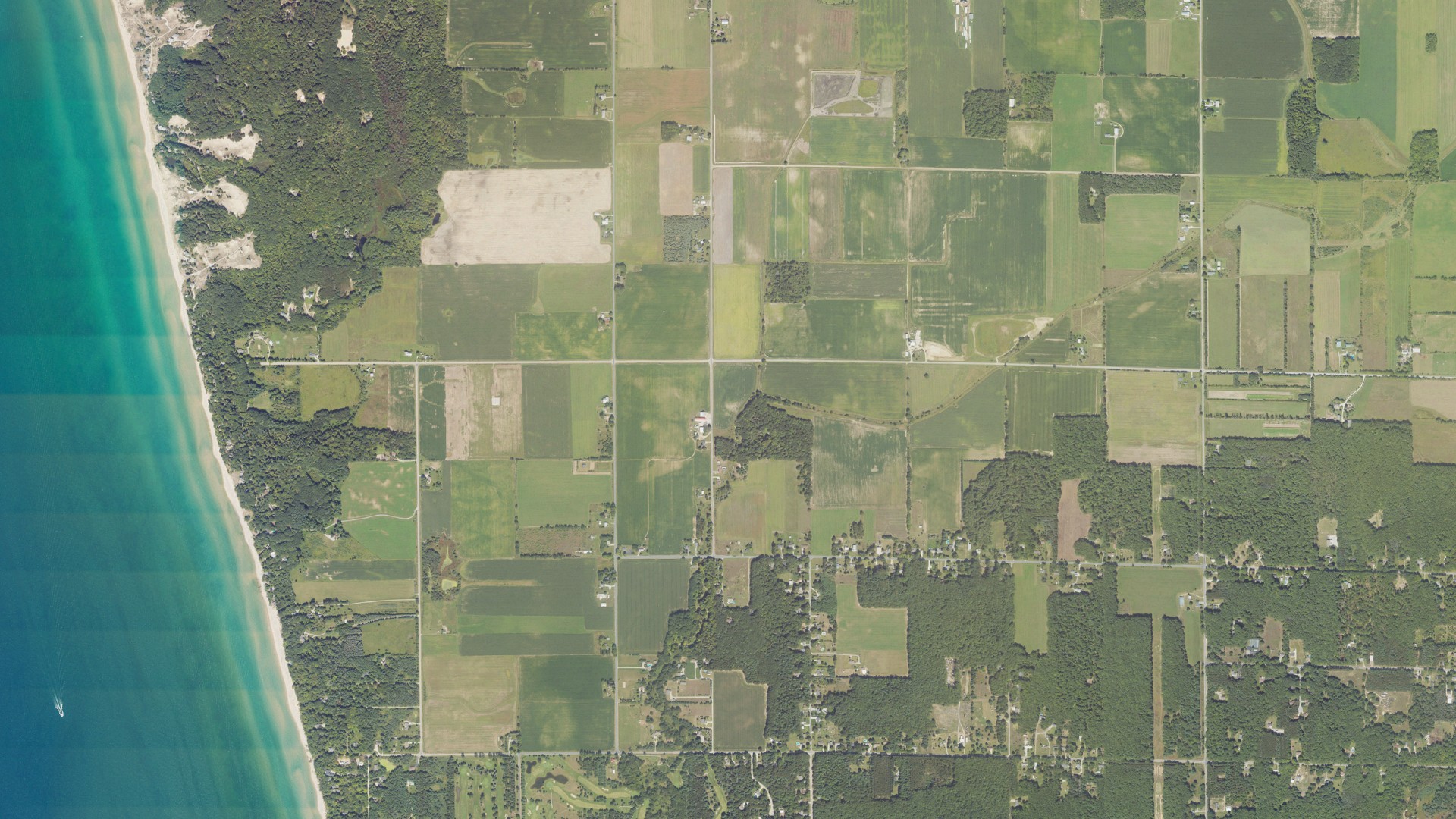 Natural-color aerial photograph of land around Muskegon County, Michigan
