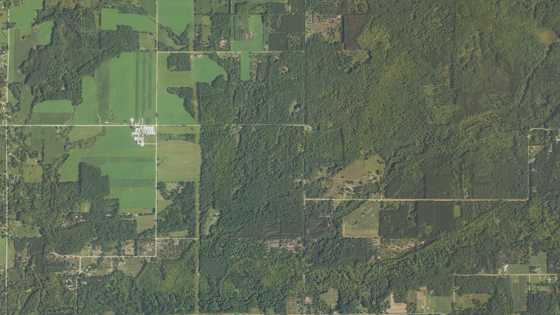 Natural-color aerial photograph of land around Denver, Michigan