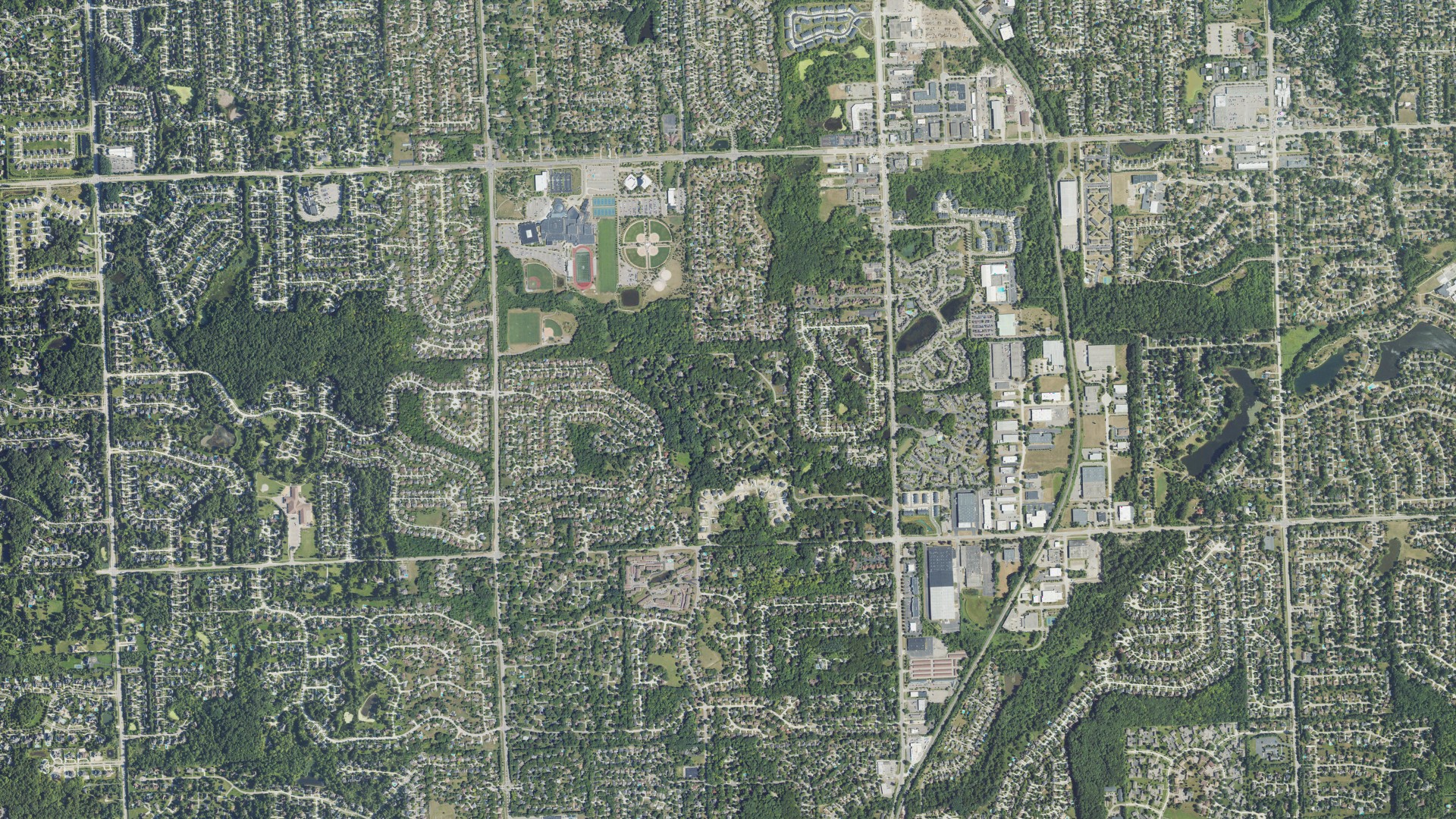 Natural-color aerial photograph of land around Novi, Michigan