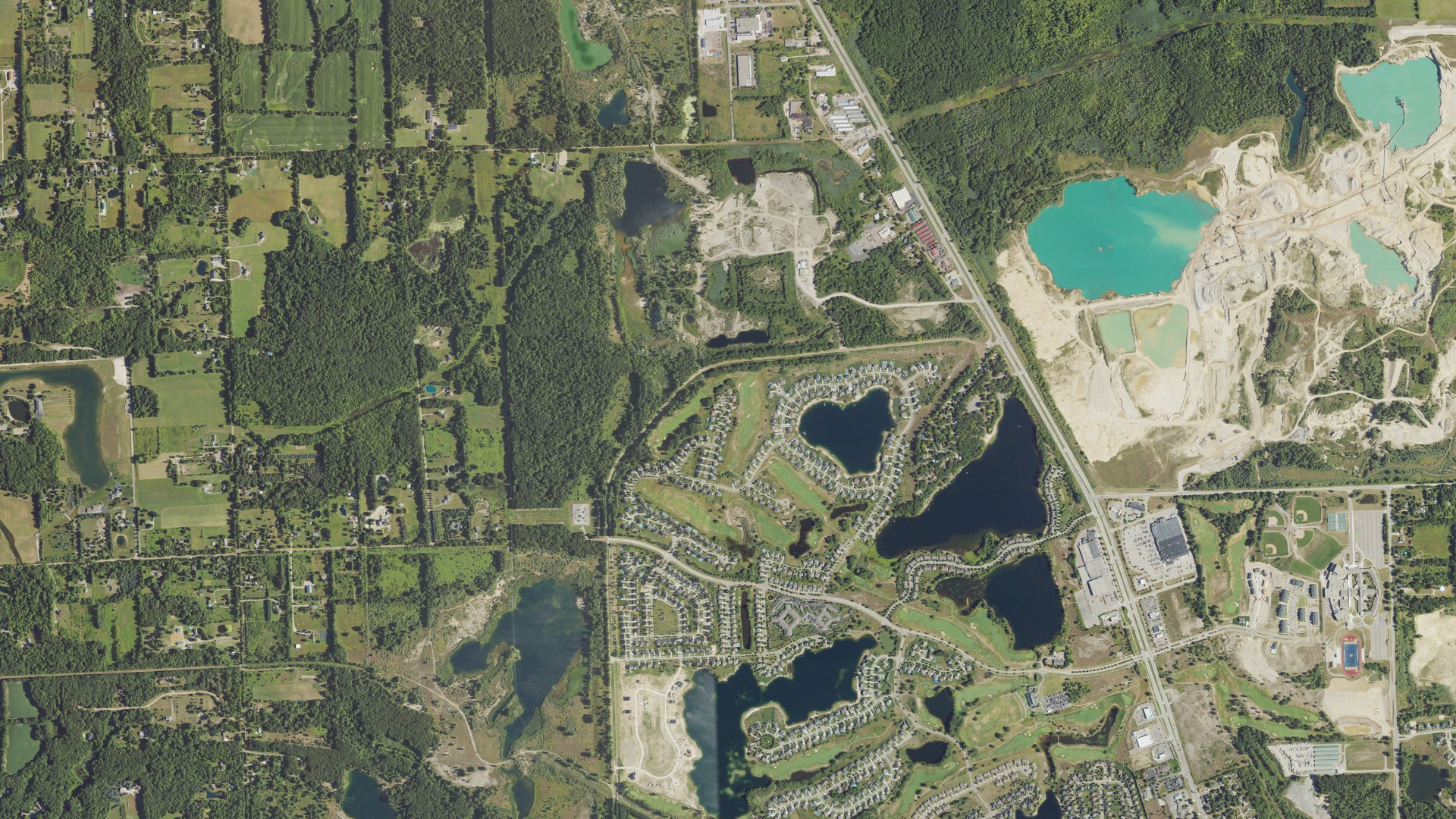 Natural-color aerial photograph of land around Oxford charter, Michigan