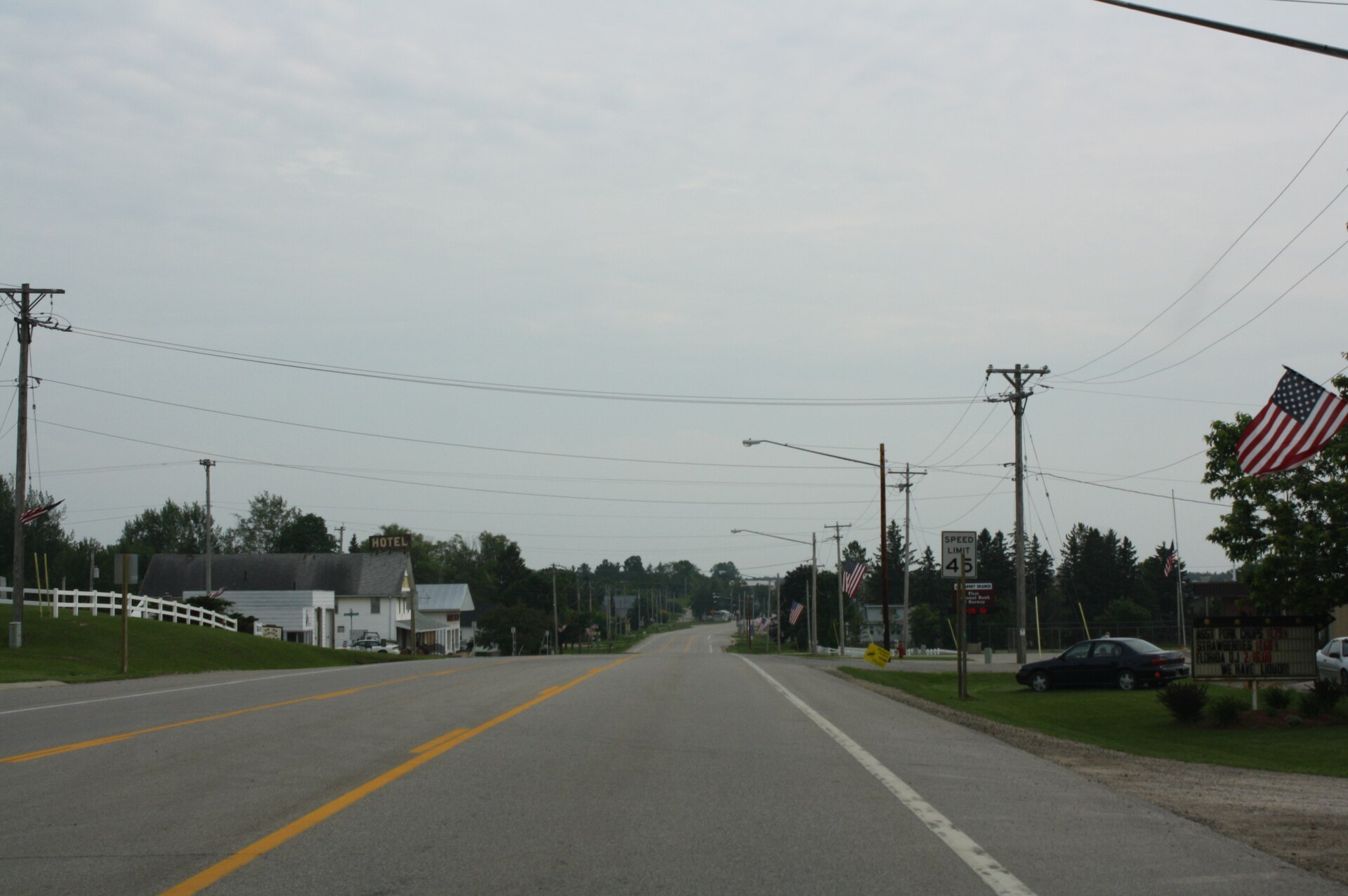 Looking south at downtown w:Carney, Michigan on w:U.S. Route 41. This file was uploaded with Commonist.
