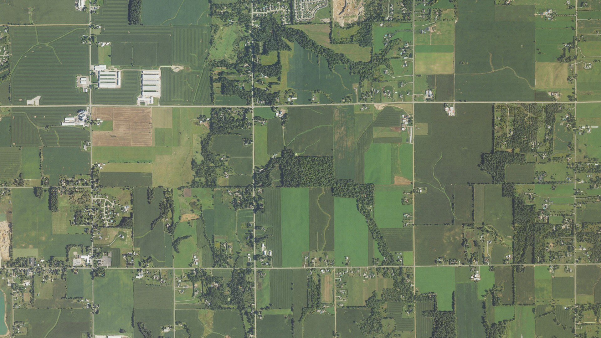 Natural-color aerial photograph of land around Jamestown charter, Michigan
