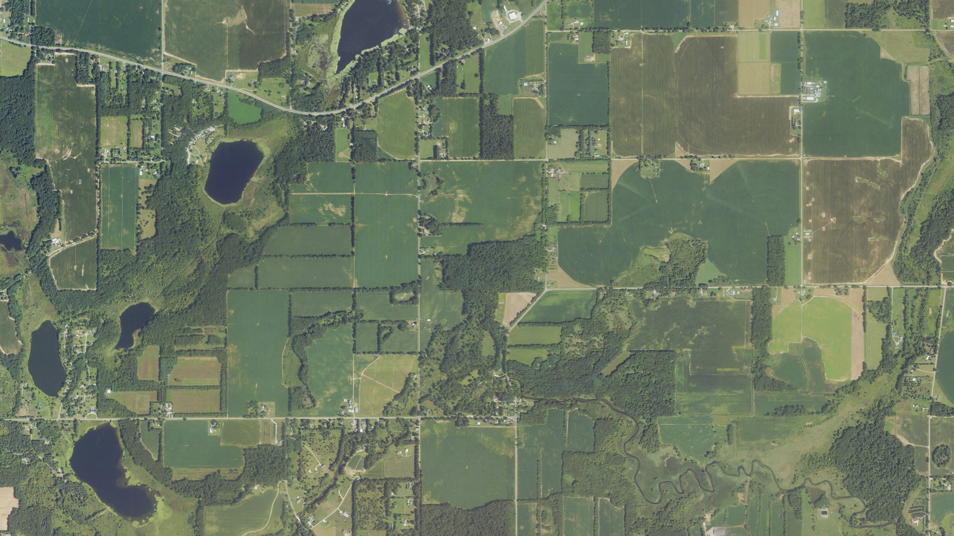 Natural-color aerial photograph of land around Fawn River, Michigan