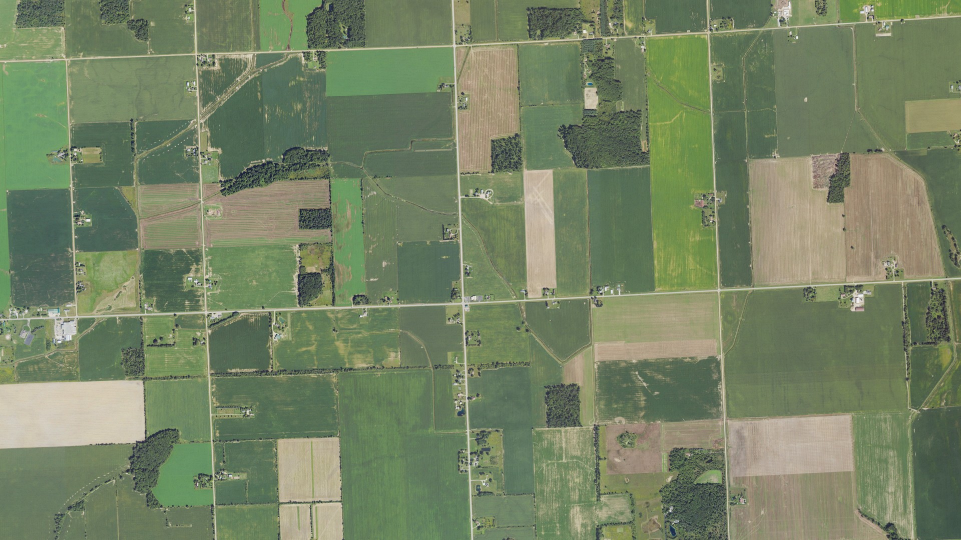 Natural-color aerial photograph of land around Moore, Michigan
