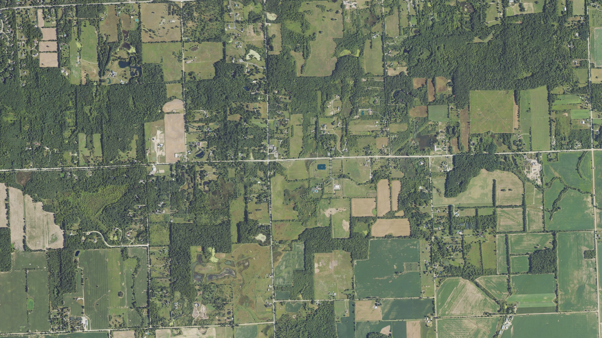 Natural-color aerial photograph of land around Superior charter, Michigan