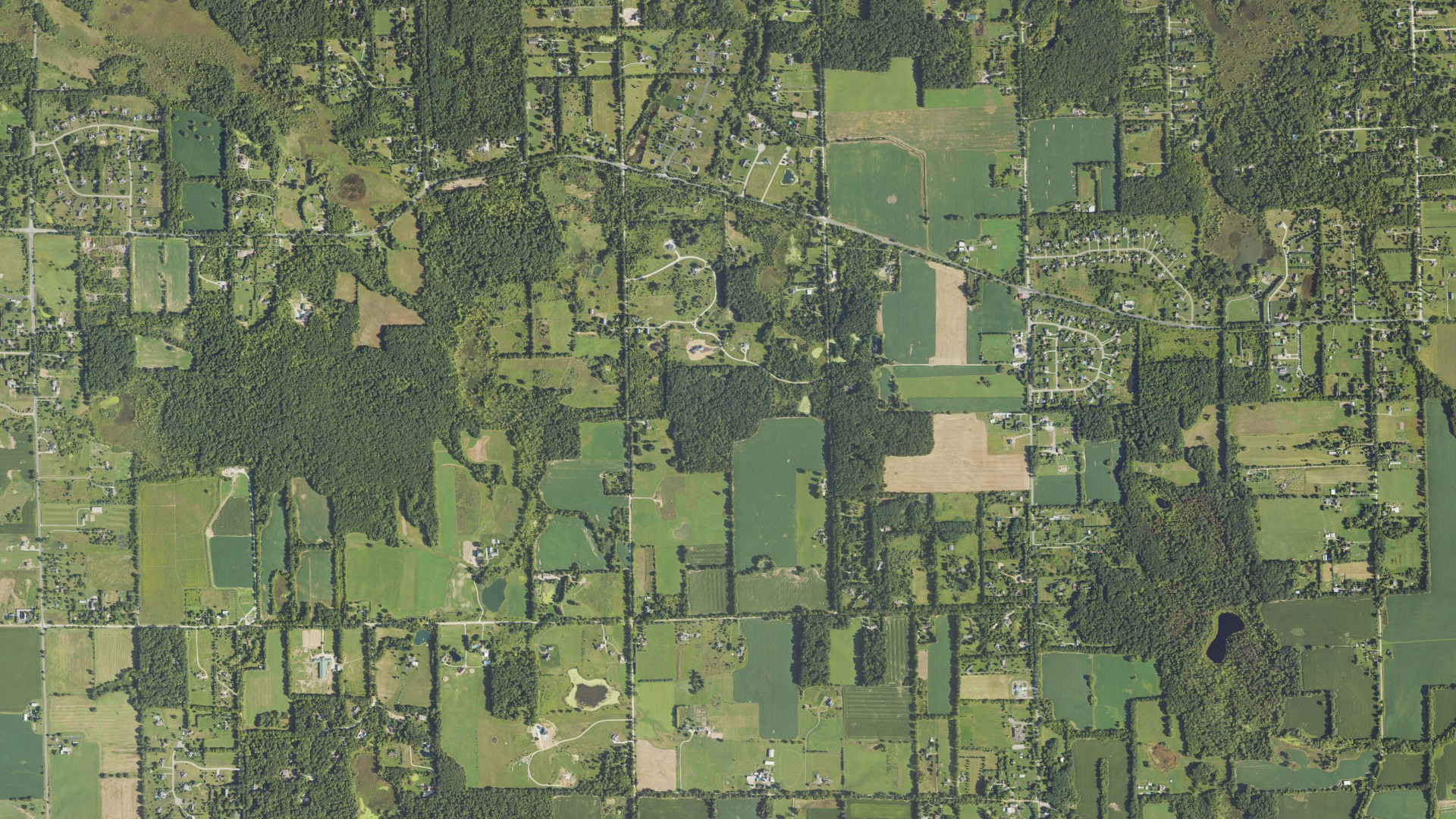 Natural-color aerial photograph of land around Webster, Michigan