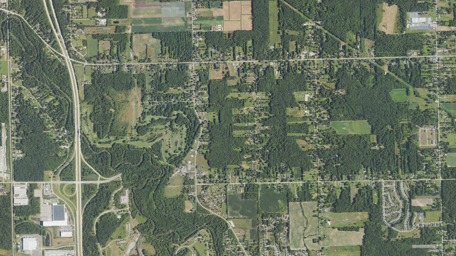 Natural-color aerial photograph of land around Huron charter, Michigan