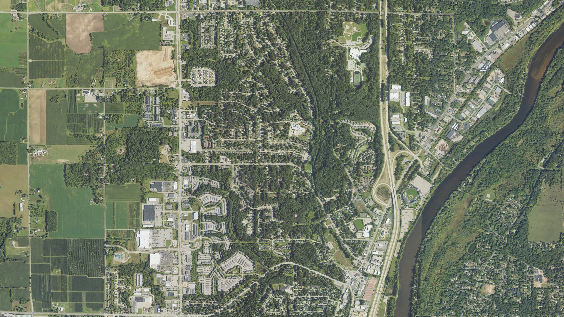 Natural-color aerial photograph of land around Comstock Park, Michigan
