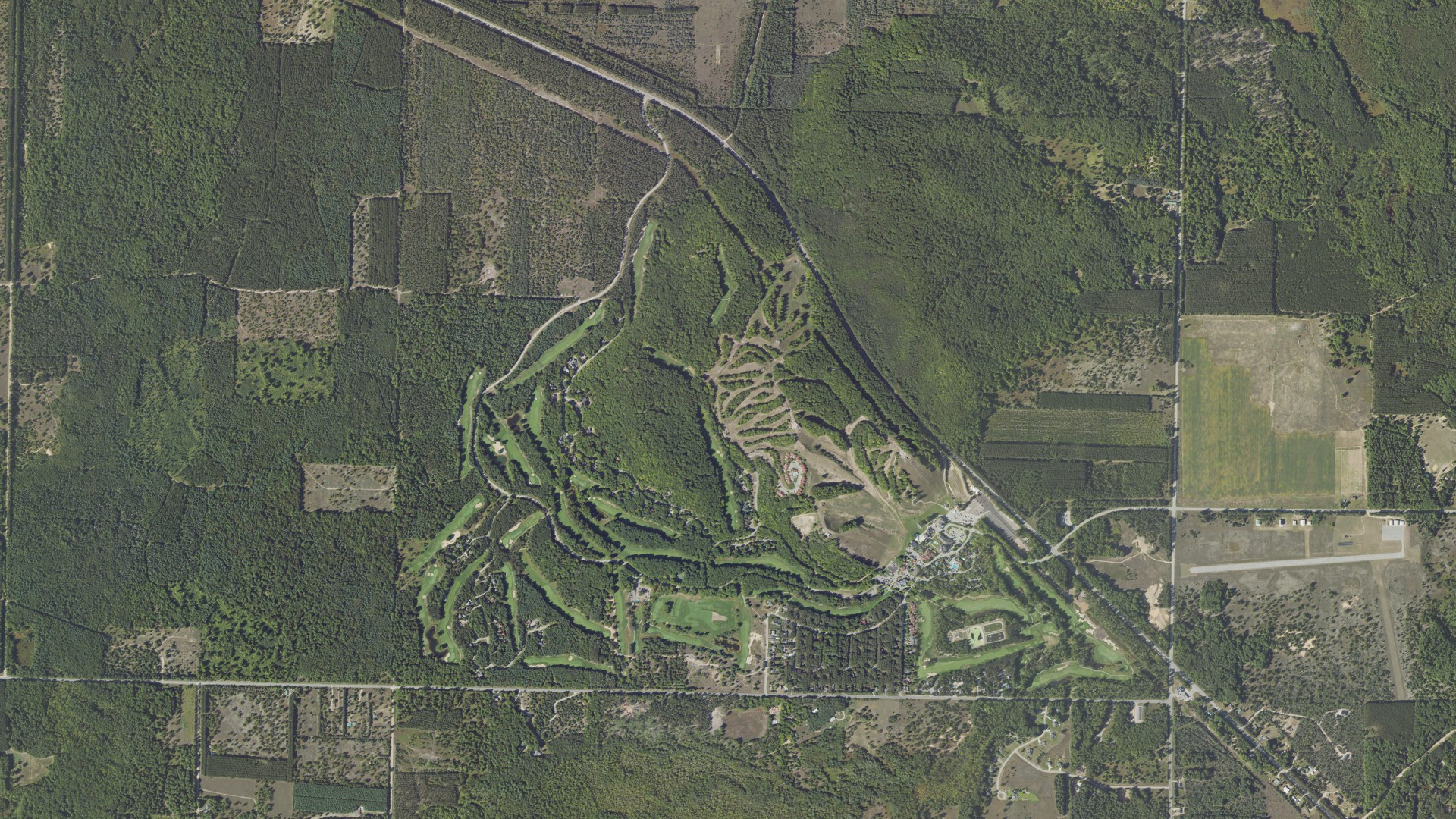Natural-color aerial photograph of land around Crystal Mountain, Michigan