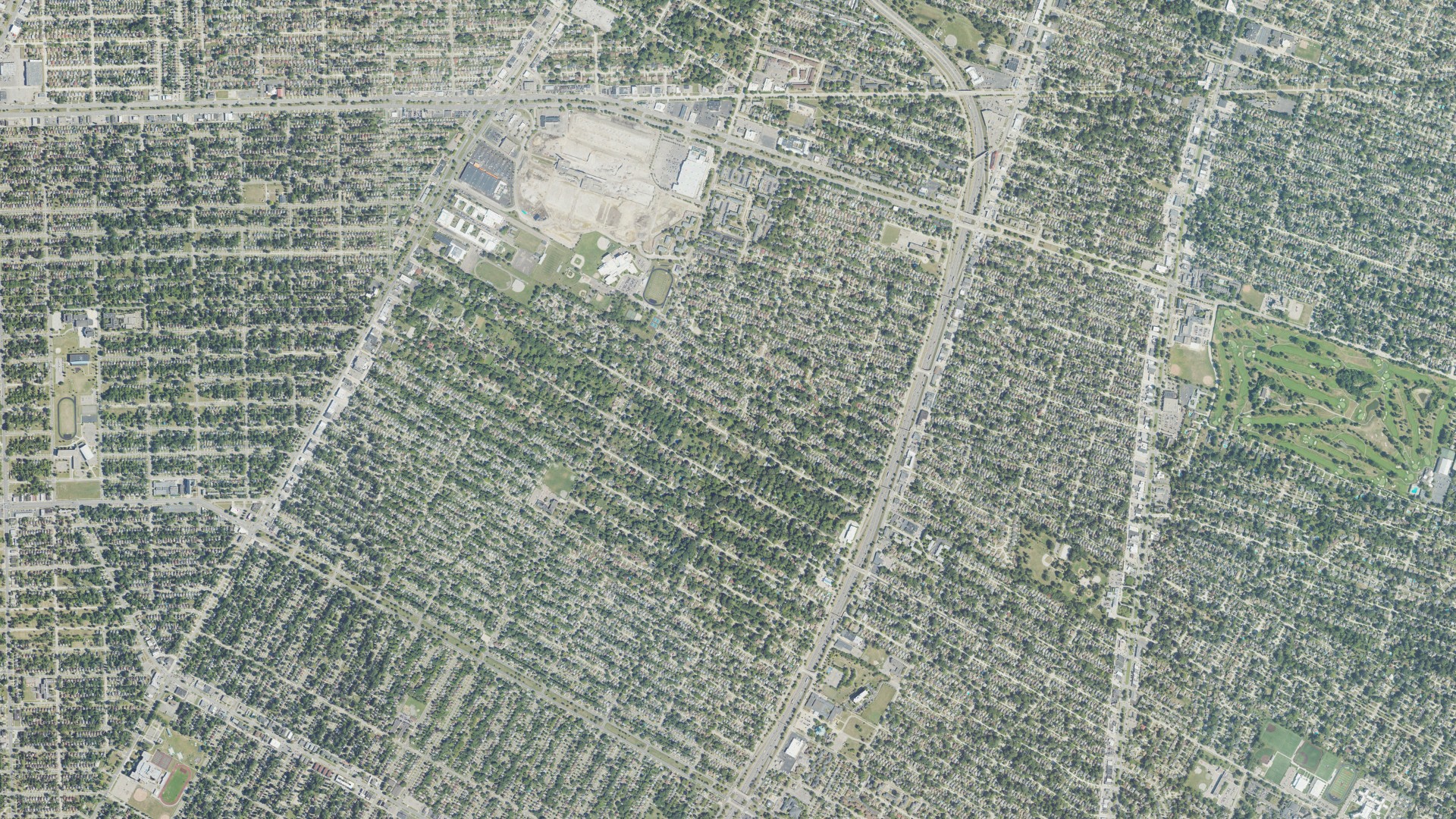 Natural-color aerial photograph of land around Harper Woods, Michigan