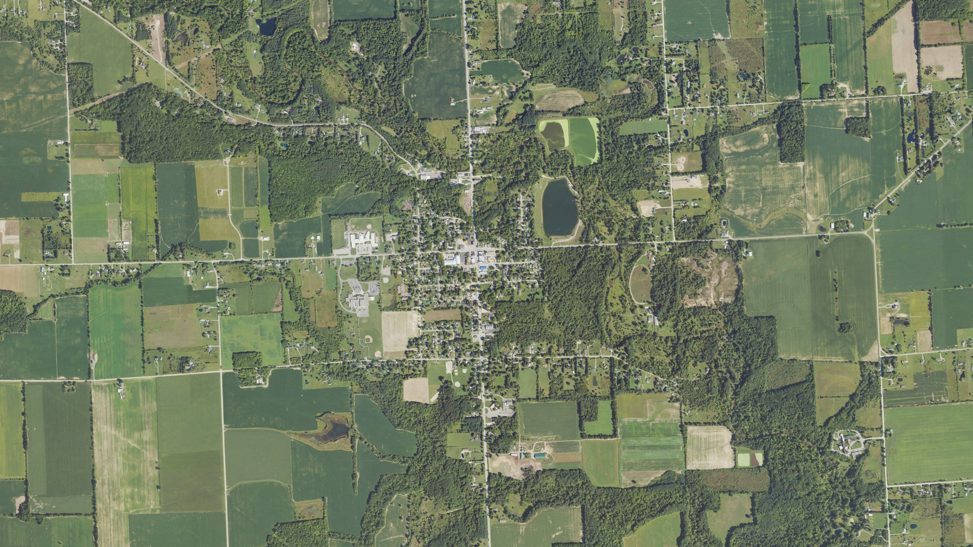 Natural-color aerial photograph of land around Memphis, Michigan