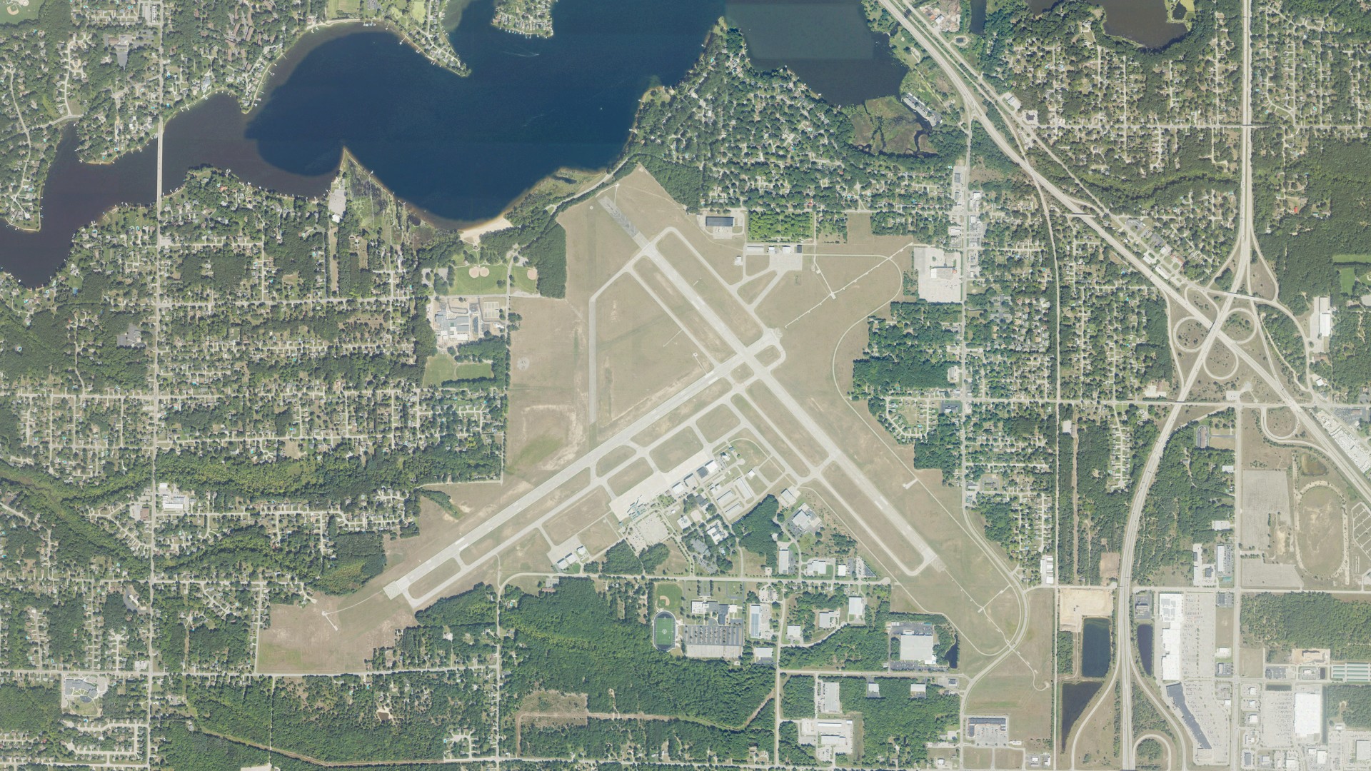 Natural-color aerial photograph of land around Norton Shores, Michigan