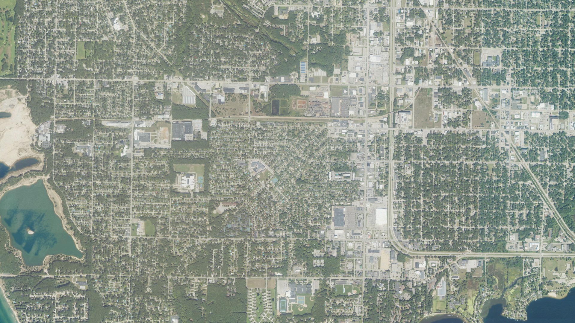Natural-color aerial photograph of land around Roosevelt Park, Michigan