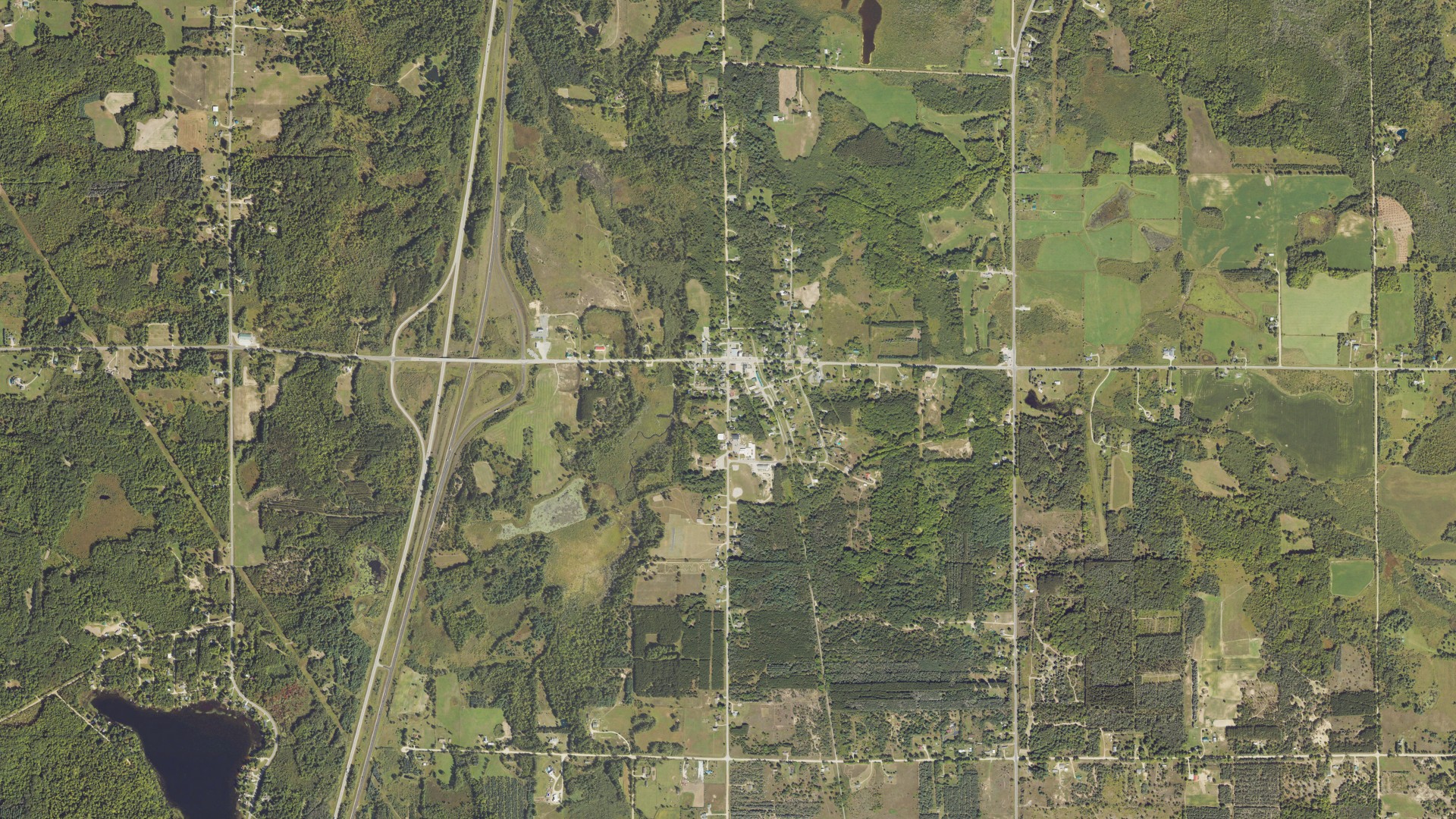 Natural-color aerial photograph of land around Tustin, Michigan
