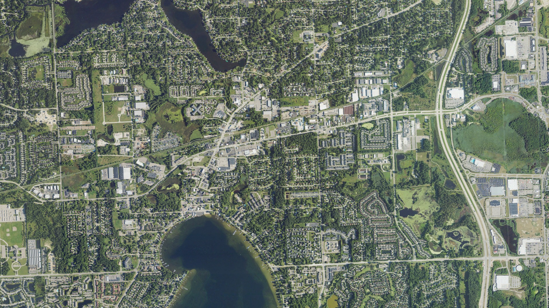 Natural-color aerial photograph of land around Walled Lake, Michigan