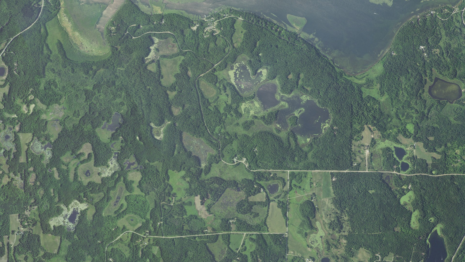 Natural-color aerial photograph of land around Shell Lake, Minnesota