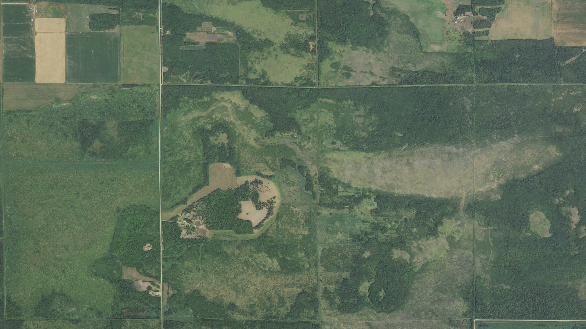 Natural-color aerial photograph of land around Hamre, Minnesota