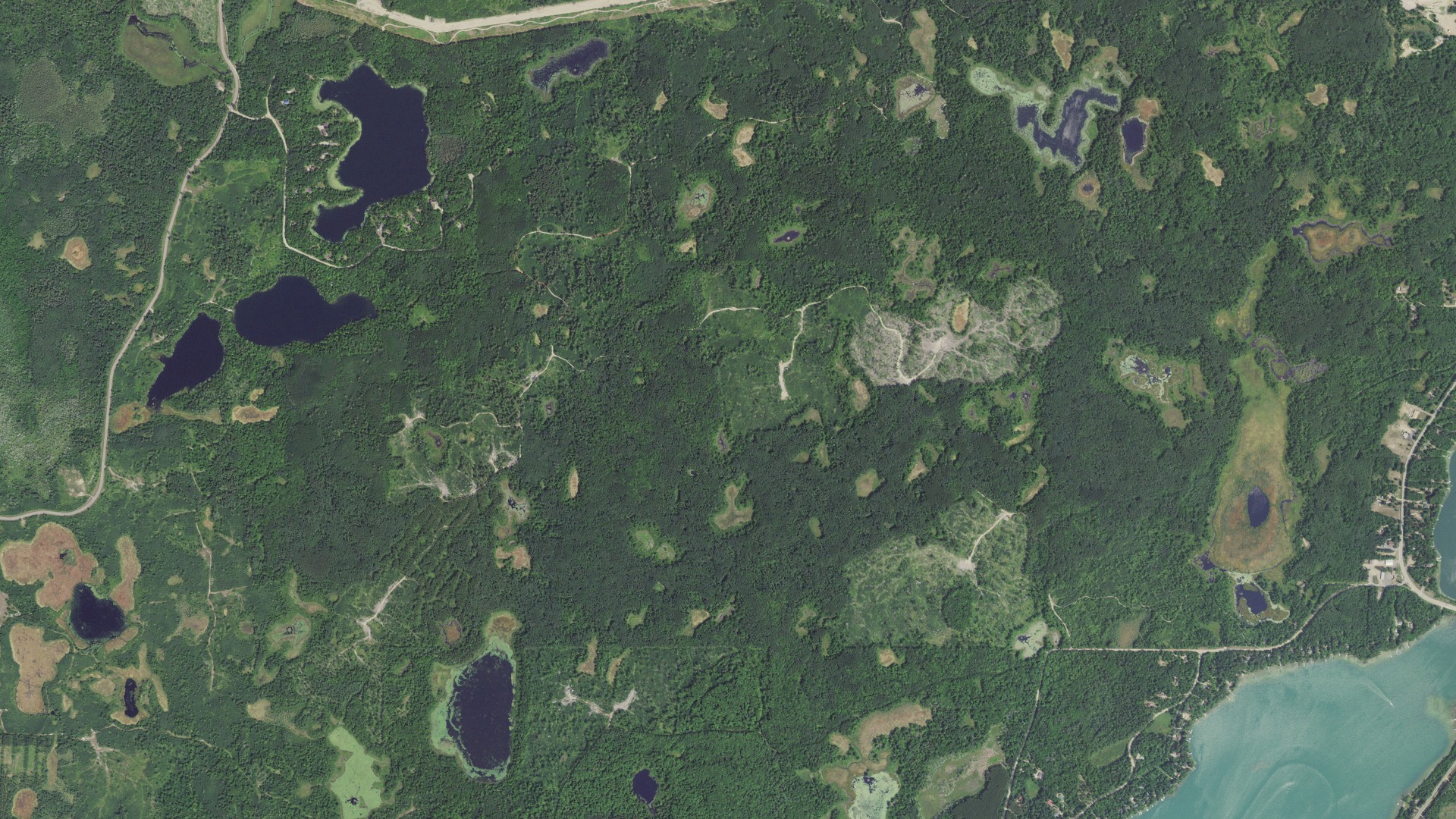 Natural-color aerial photograph of land around Crooked Lake, Minnesota