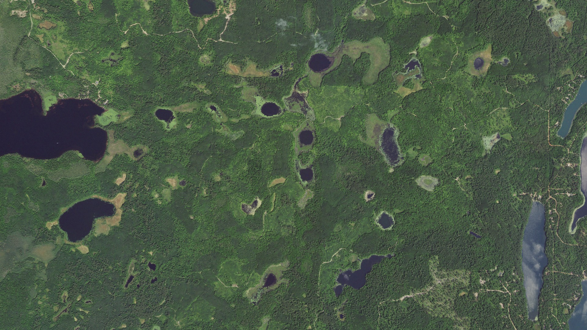 Natural-color aerial photograph of land around Thunder Lake, Minnesota