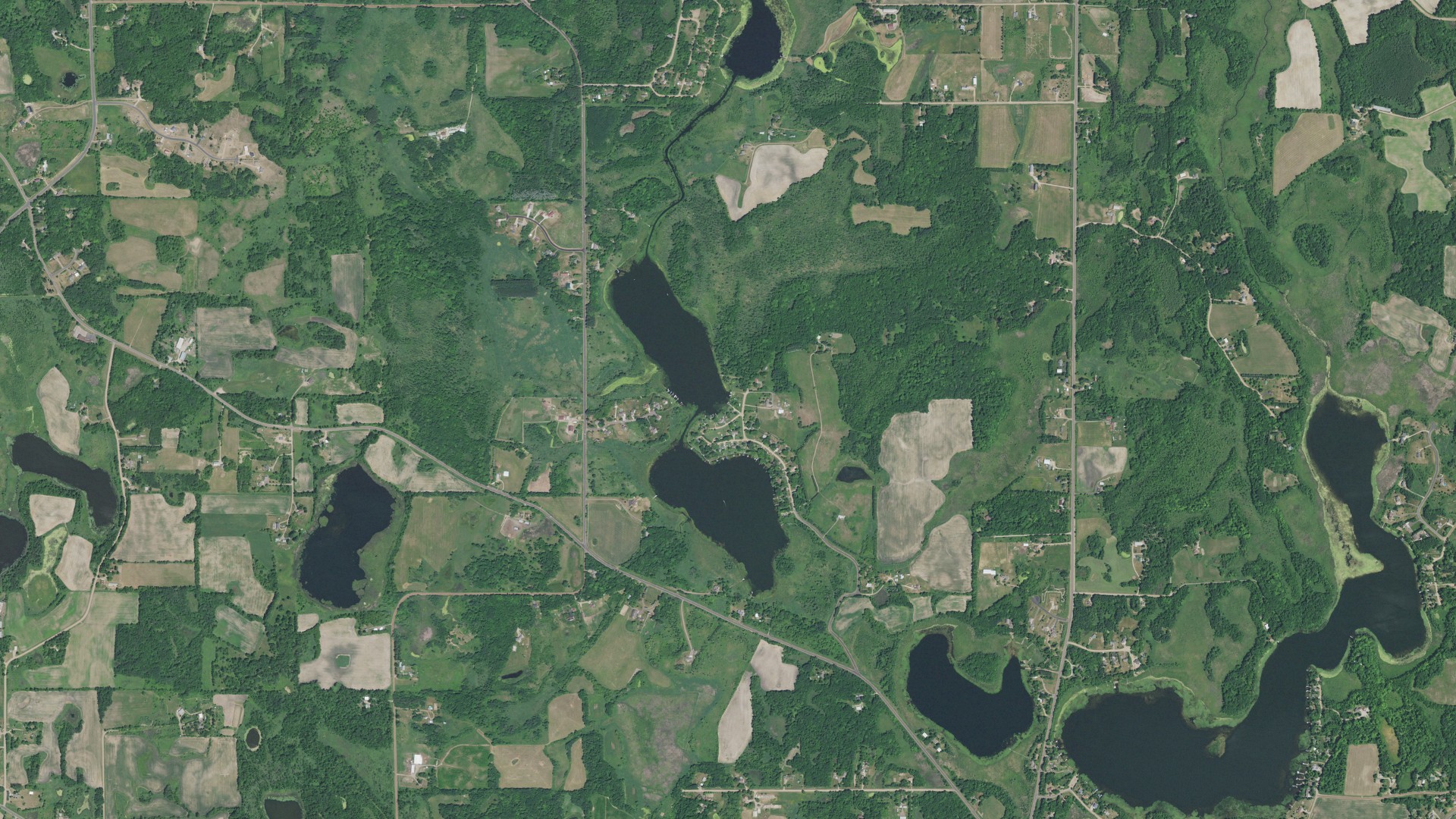 Natural-color aerial photograph of land around Fish Lake, Minnesota