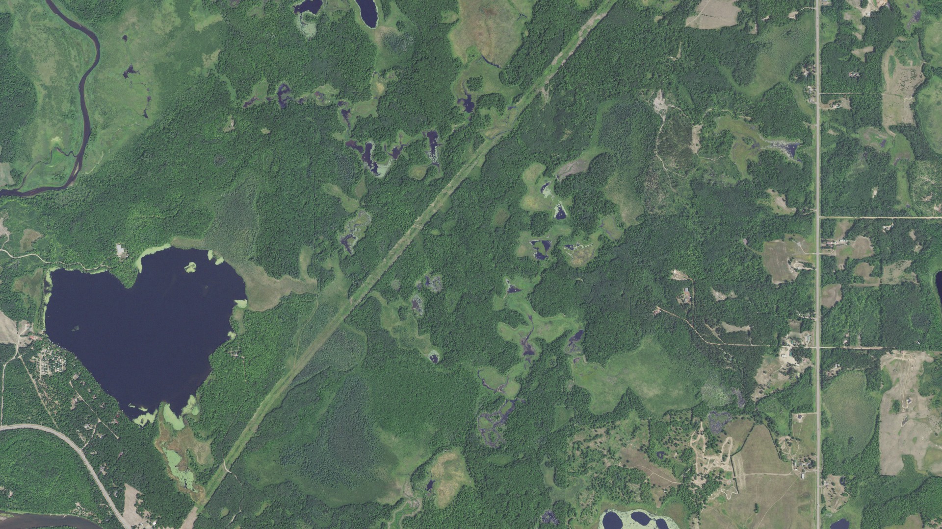 Natural-color aerial photograph of land around Perry Lake, Minnesota
