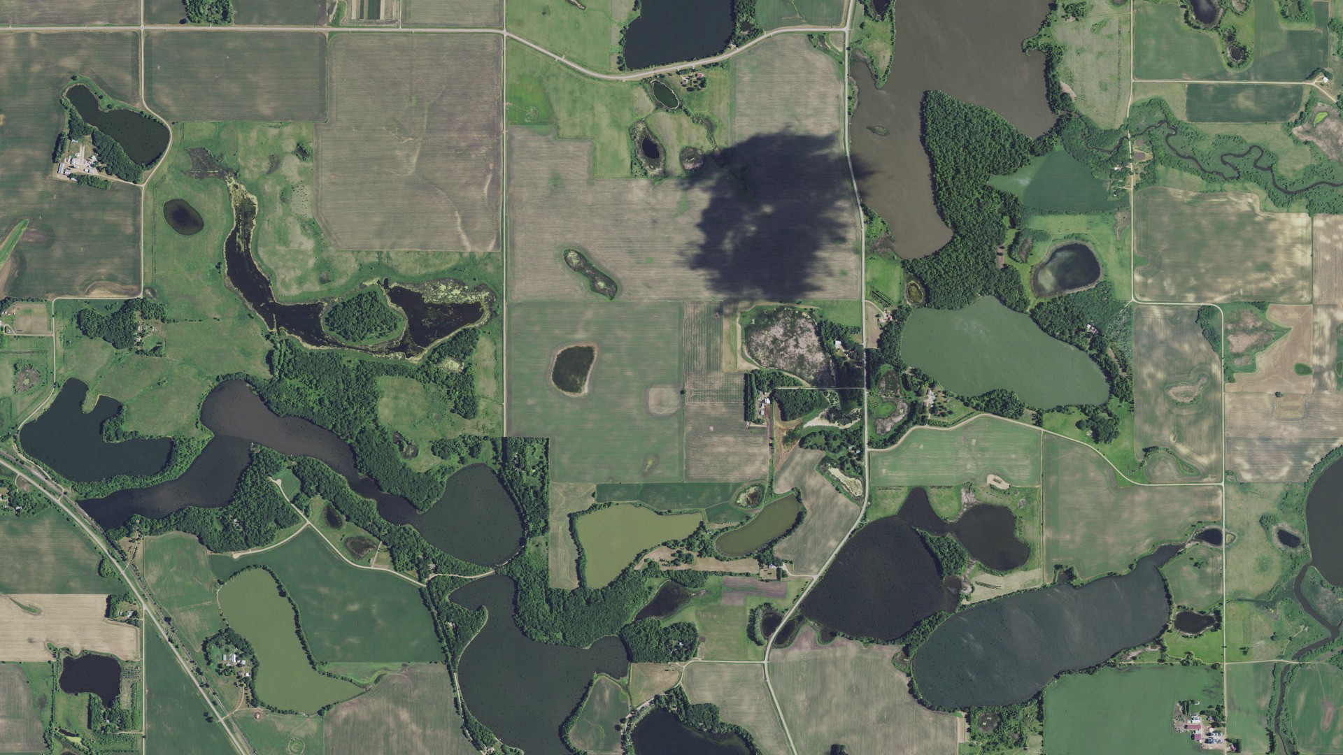 Natural-color aerial photograph of land around Elk Lake, Minnesota