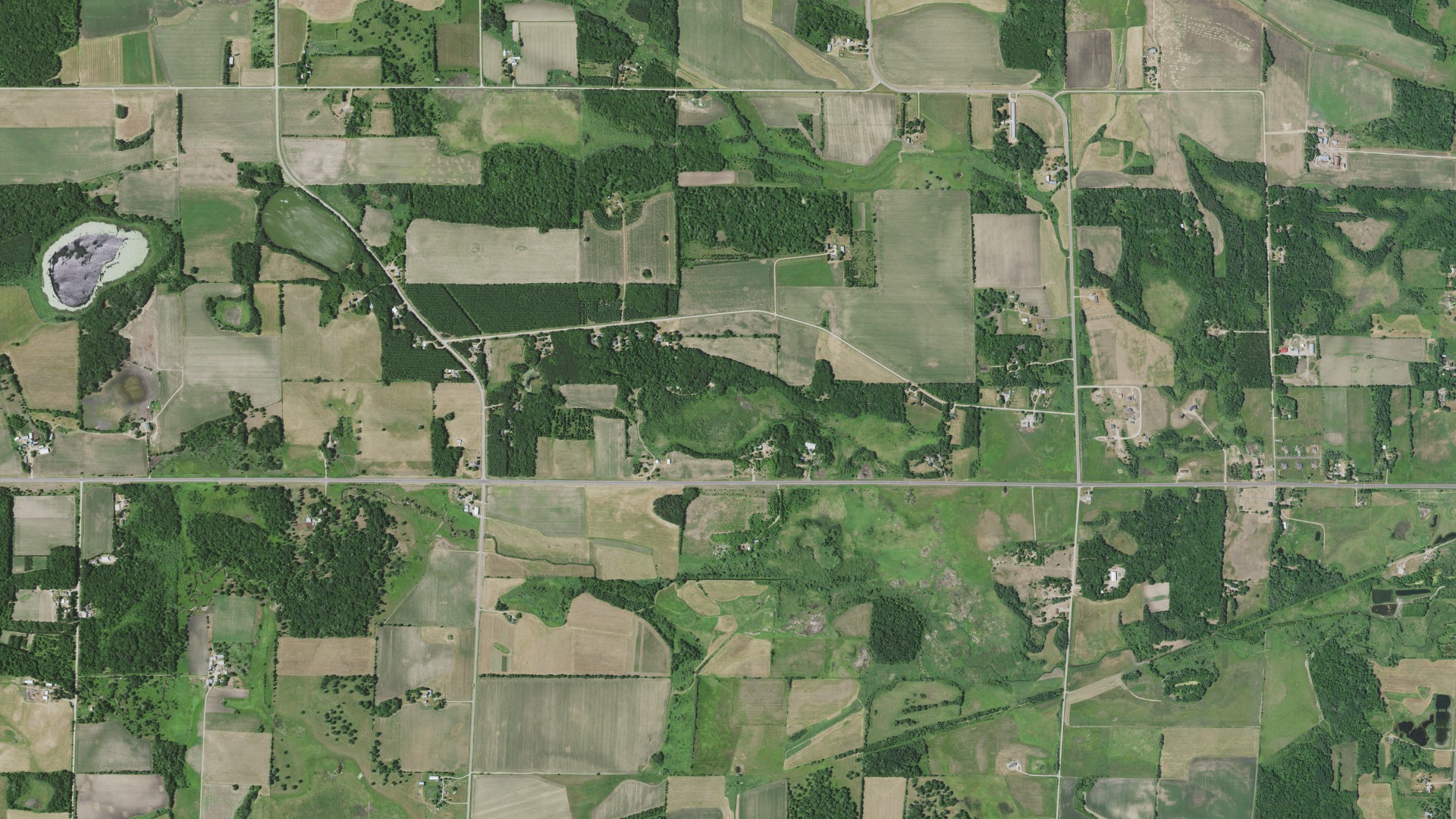 Natural-color aerial photograph of land around Pike Creek, Minnesota