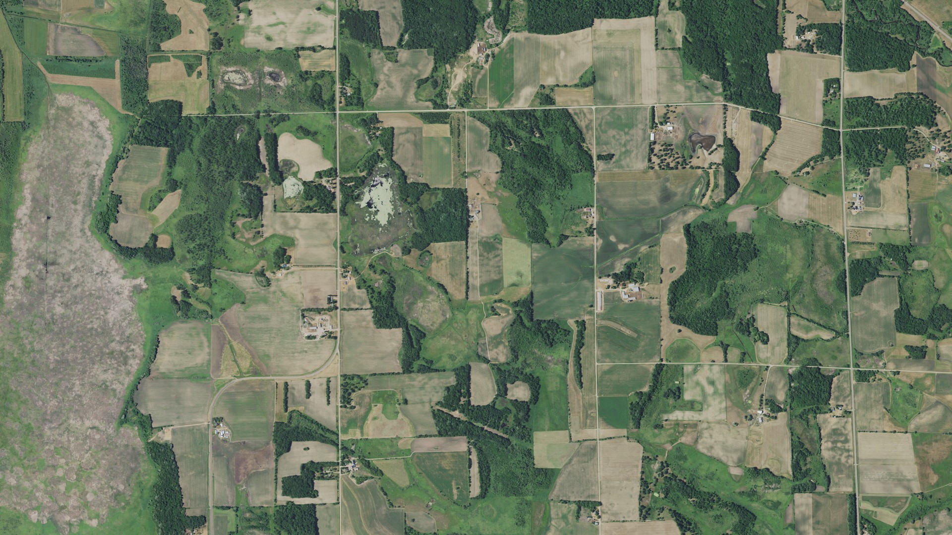Natural-color aerial photograph of land around Swanville, Minnesota