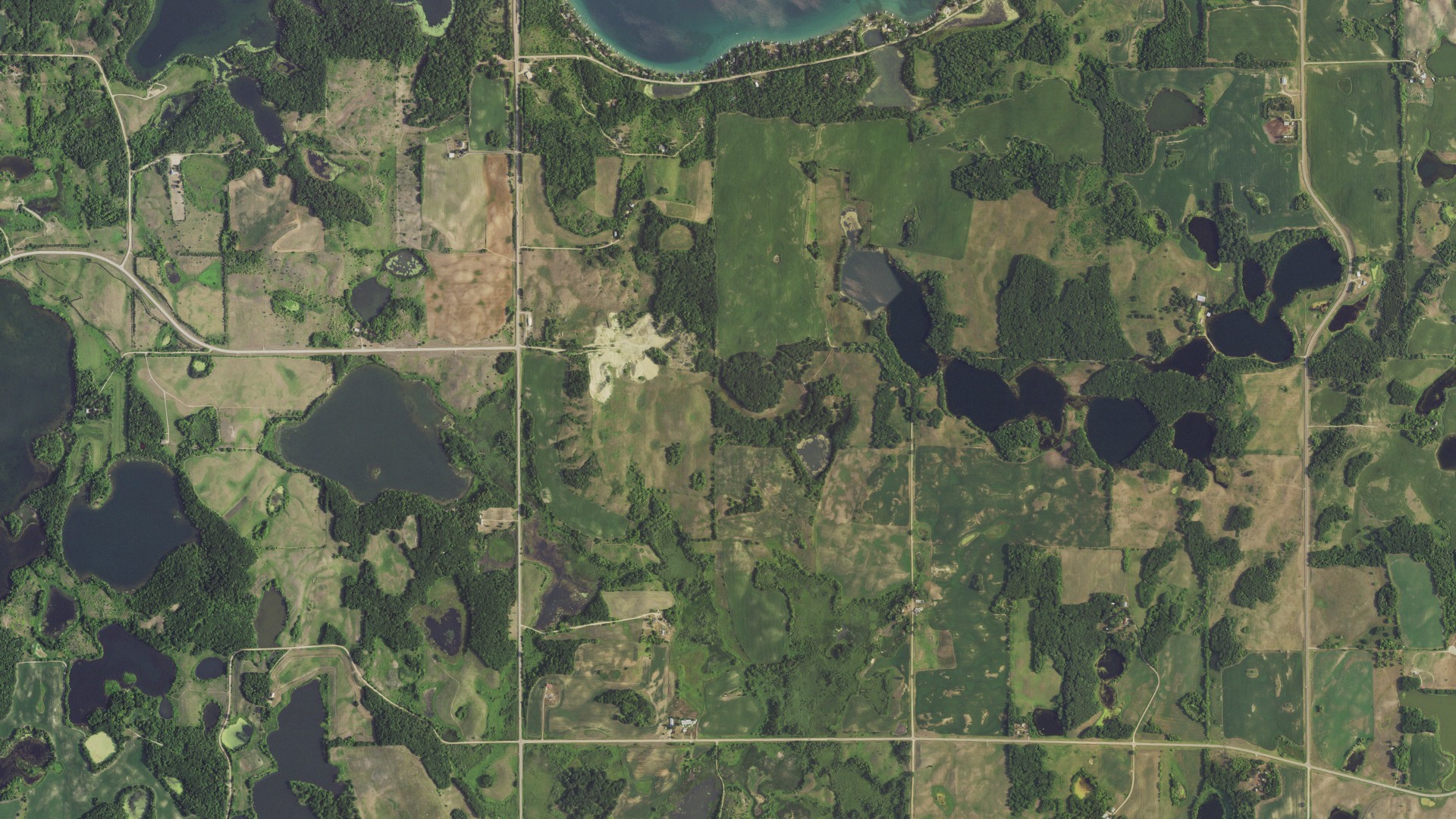 Natural-color aerial photograph of land around Eagle Lake, Minnesota