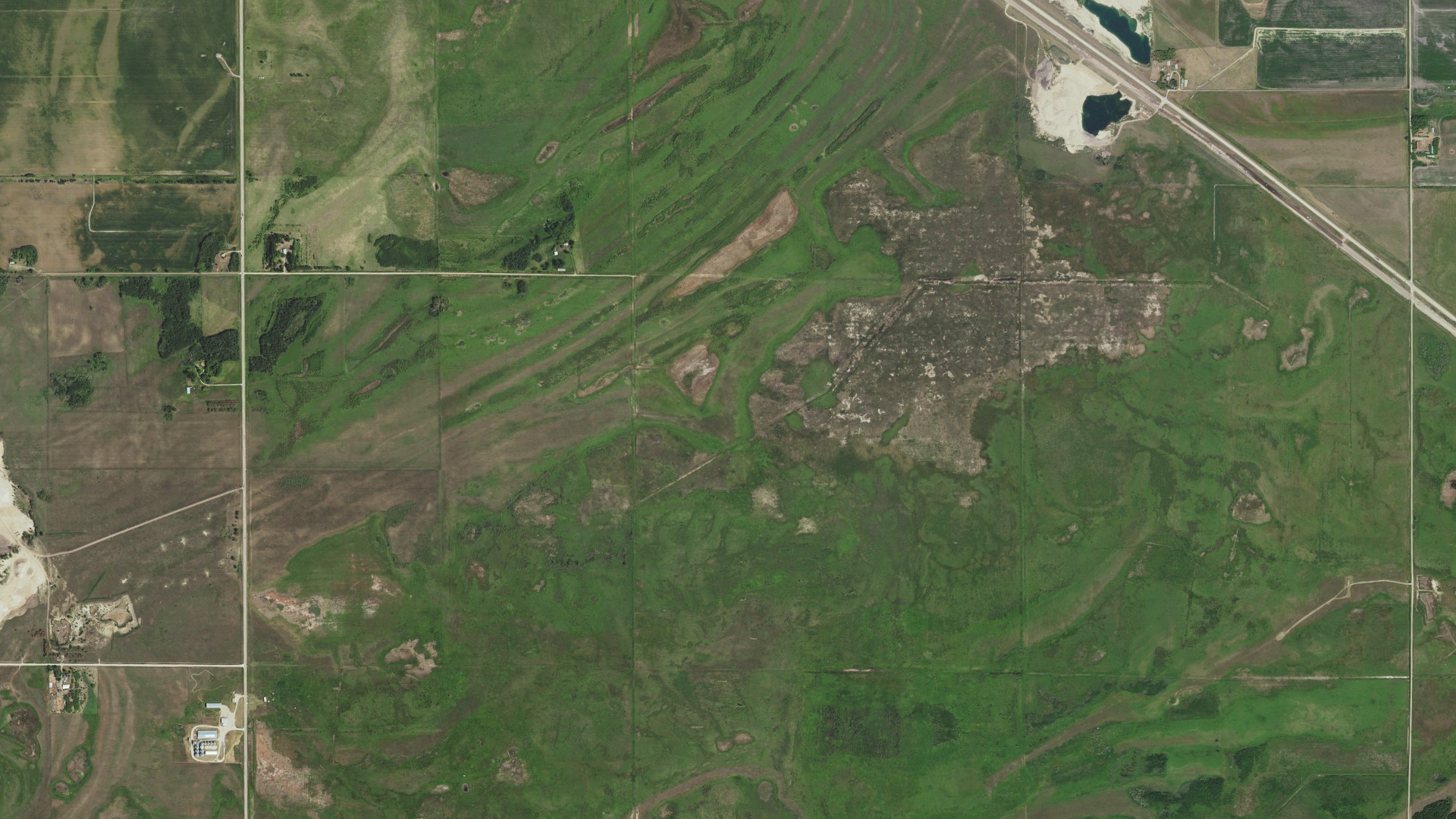 Natural-color aerial photograph of land around Grove Park-Tilden, Minnesota