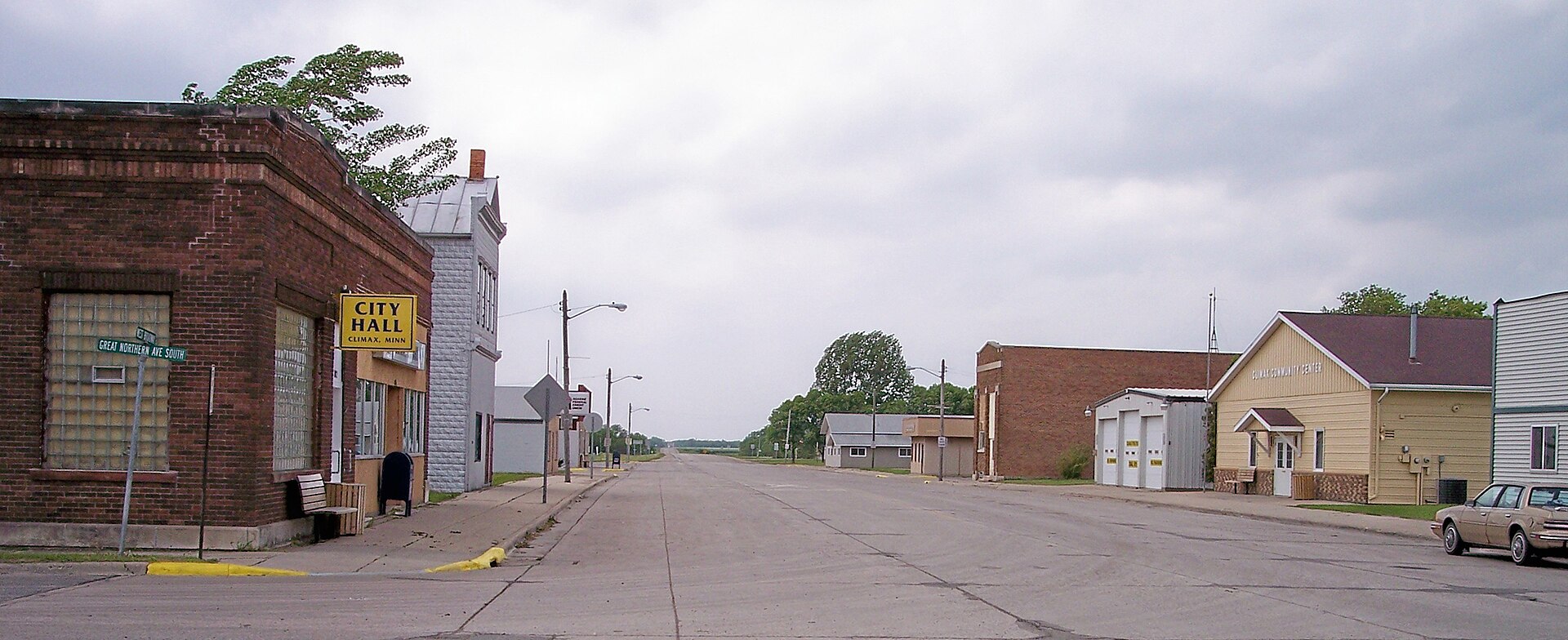 Broadway (w:Minnesota State Highway 220) in w:Climax, Minnesota. City Hall is at left.