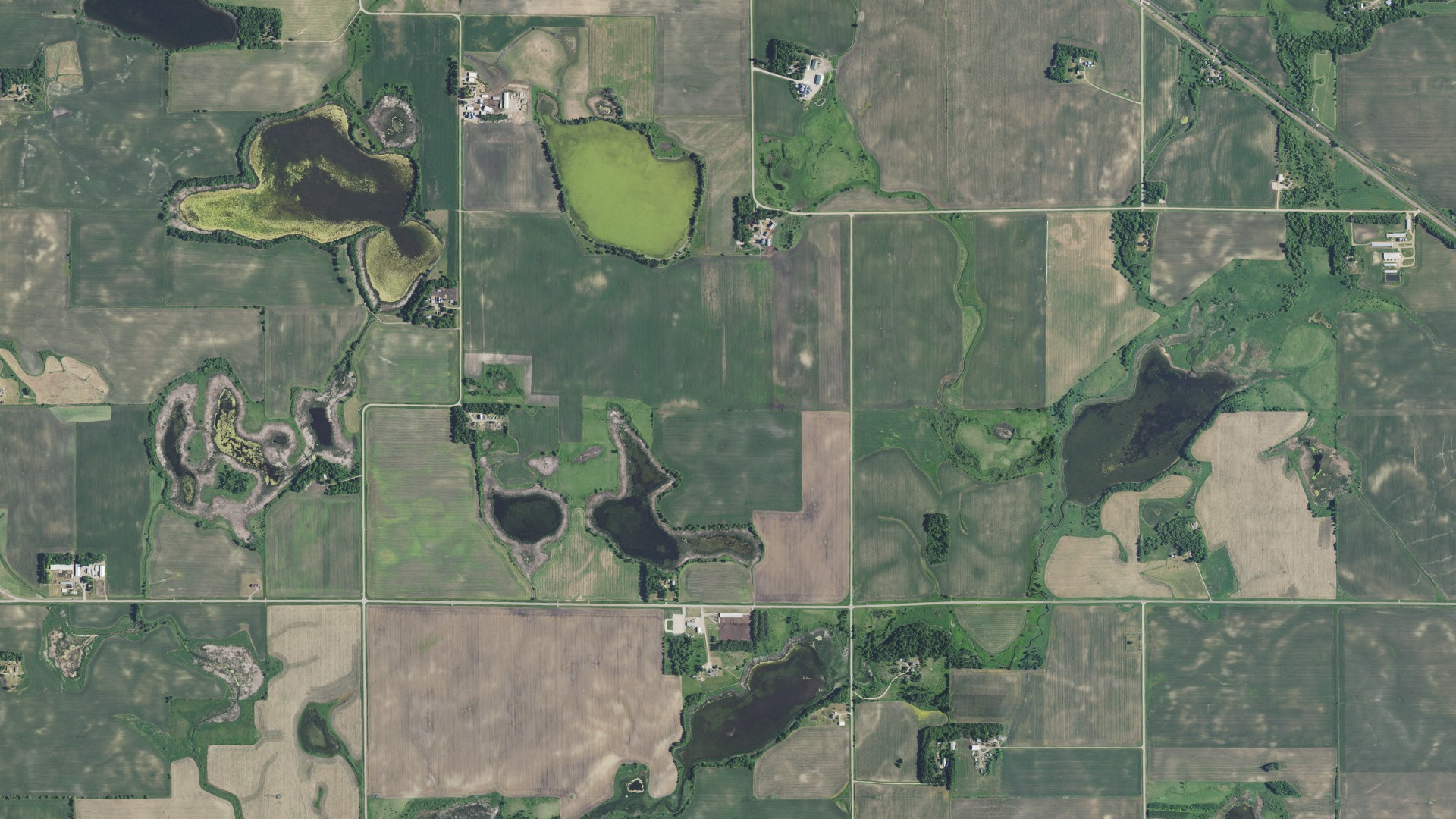 Natural-color aerial photograph of land around Ben Wade, Minnesota
