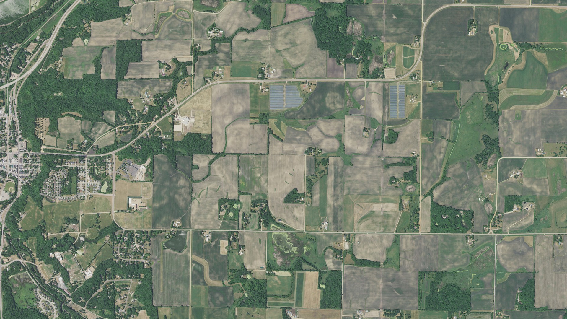 Aerial view of land around Sand Creek, Minnesota