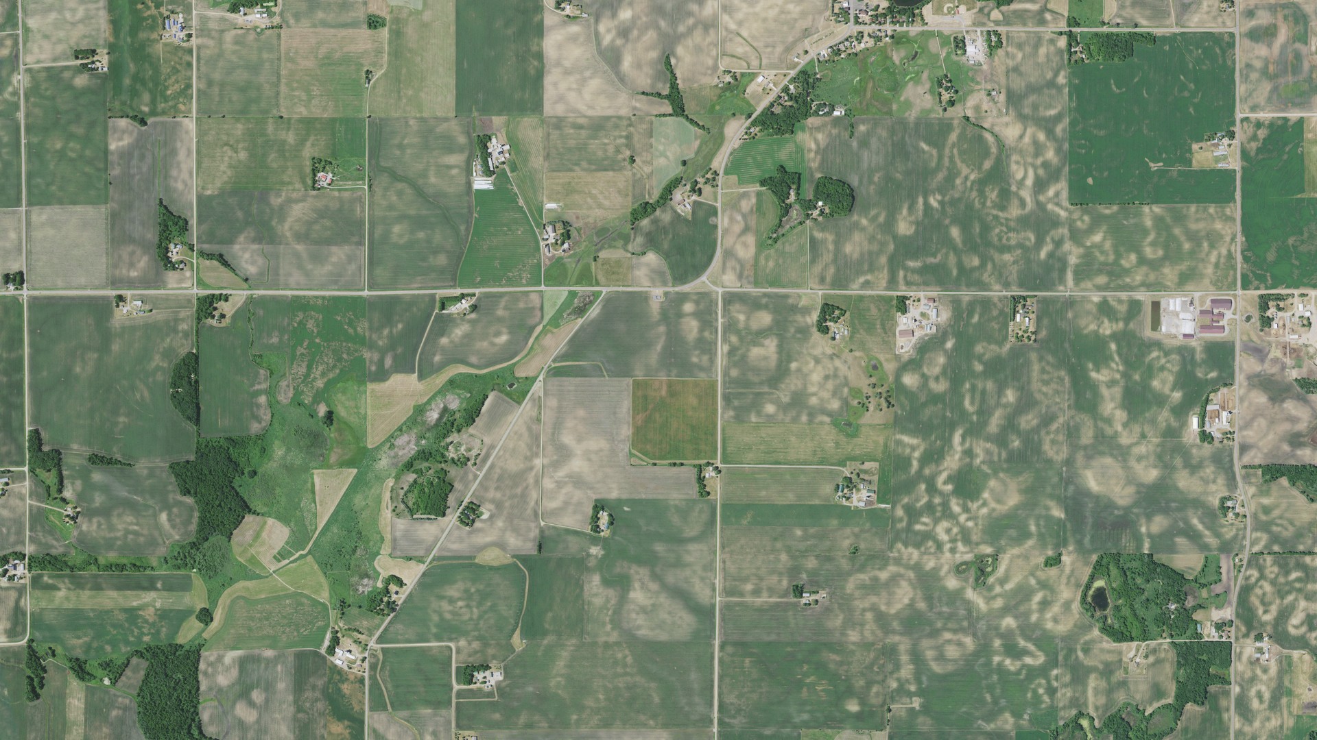 Natural-color aerial photograph of land around Luxemburg, Minnesota