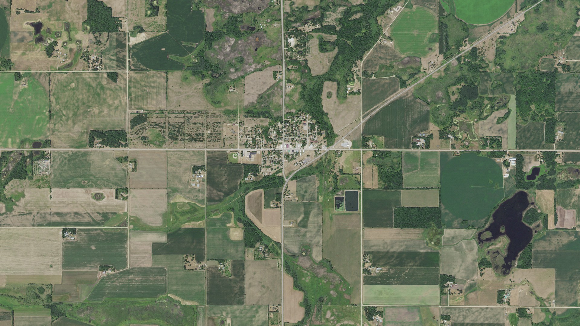 Natural-color aerial photograph of land around Deer Creek, Minnesota