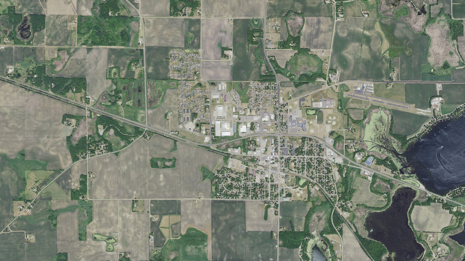 Natural-color aerial photograph of land around Maple Lake, Minnesota