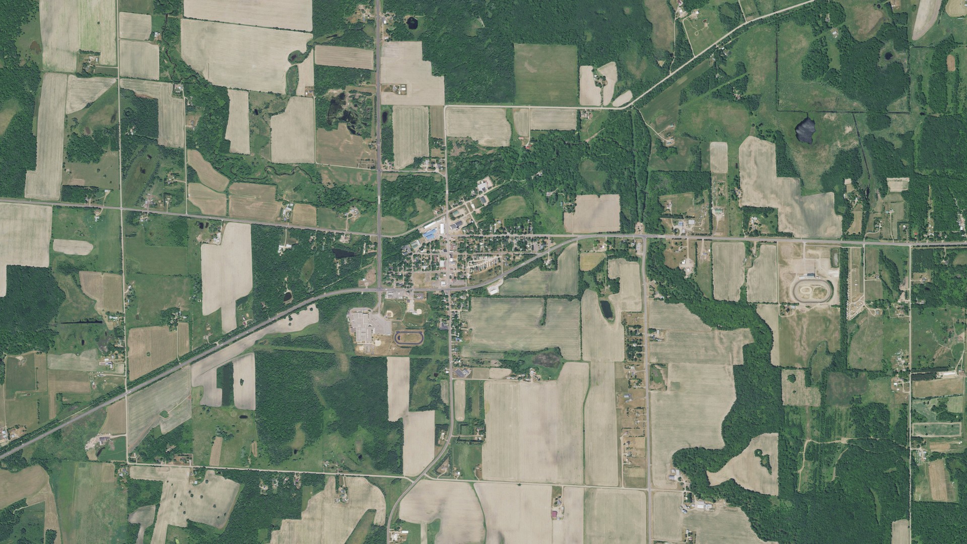 Natural-color aerial photograph of land around Ogilvie, Minnesota