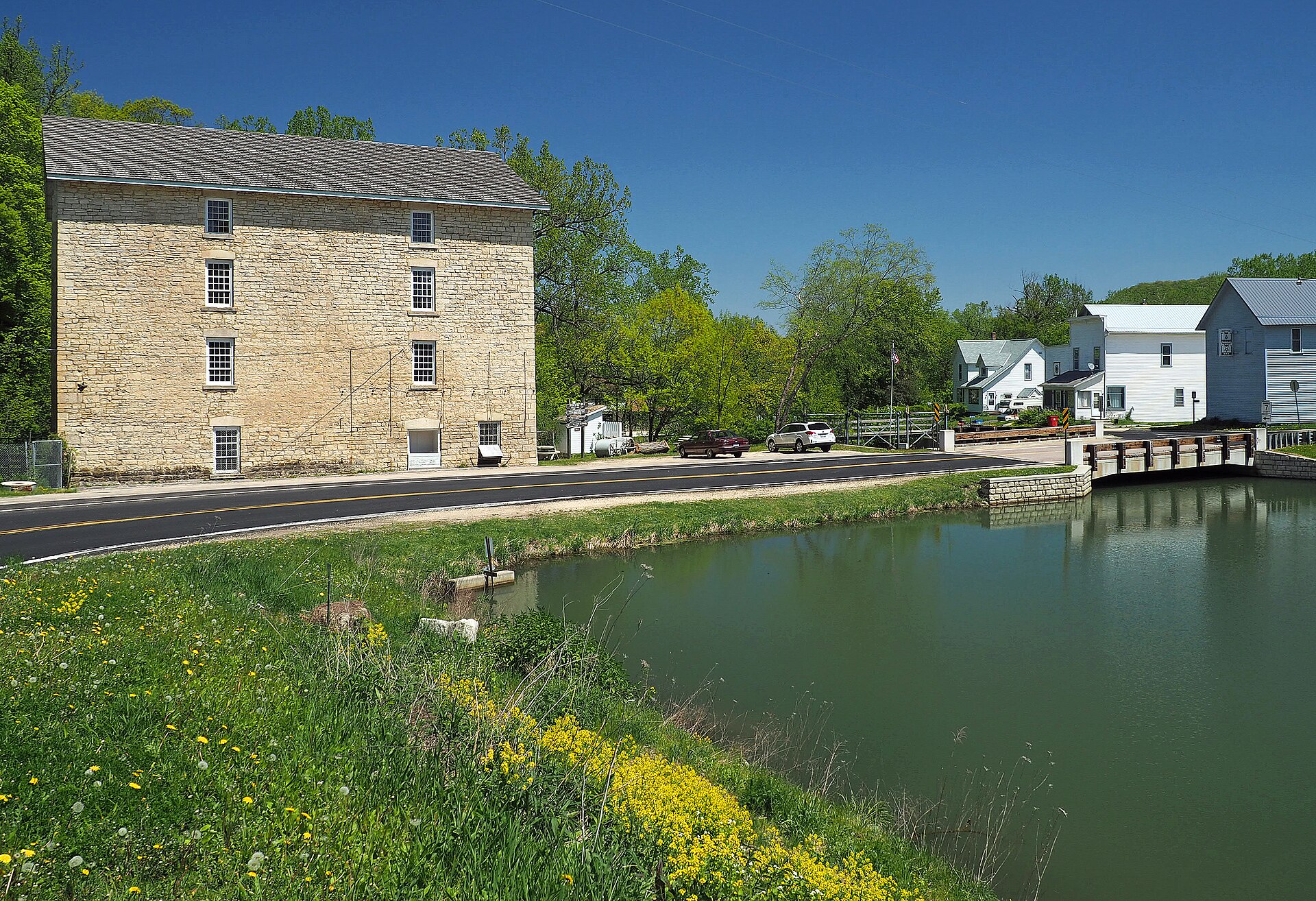 Pickwick, Minnesota, USA - view looking northeast from County Highway 7 toward the Pickwick Mill, millpond, and modern residences.